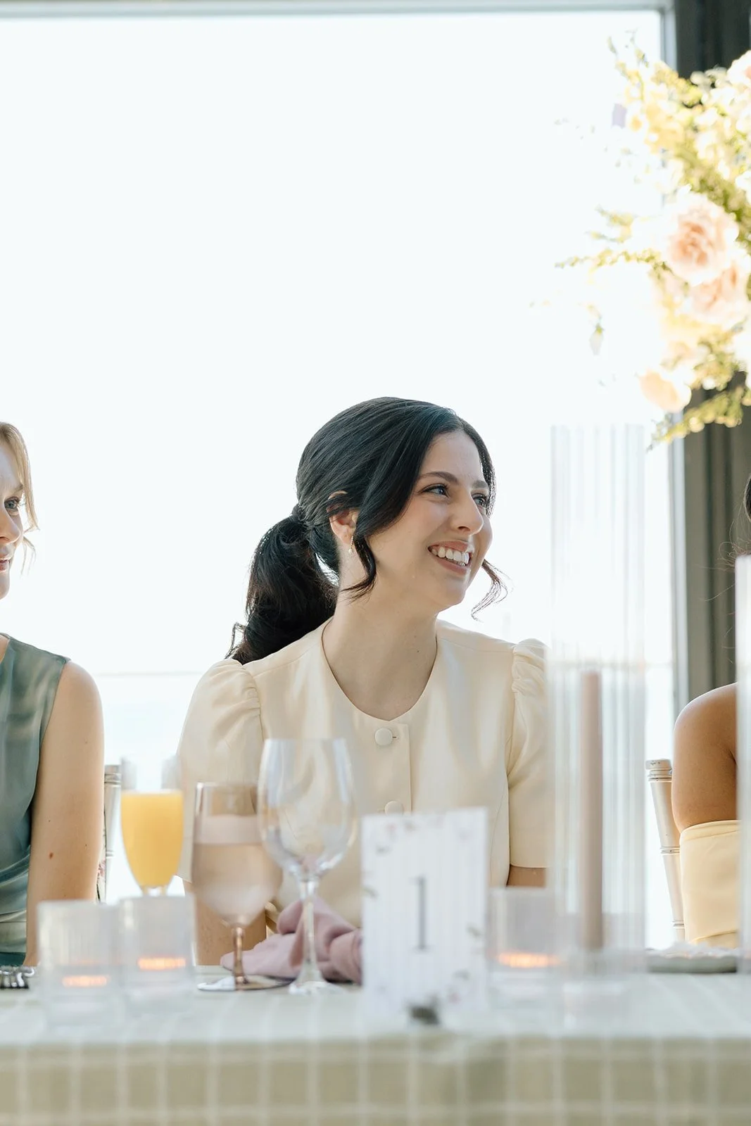  Mom and bride share a moment during their thank you speeches at the bridal shower, hosted at Spencer’s on the Waterfront. 