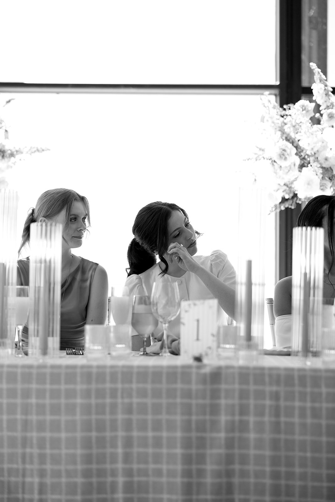  Mom and bride share a moment during their thank you speeches at the bridal shower, hosted at Spencer’s on the Waterfront. 