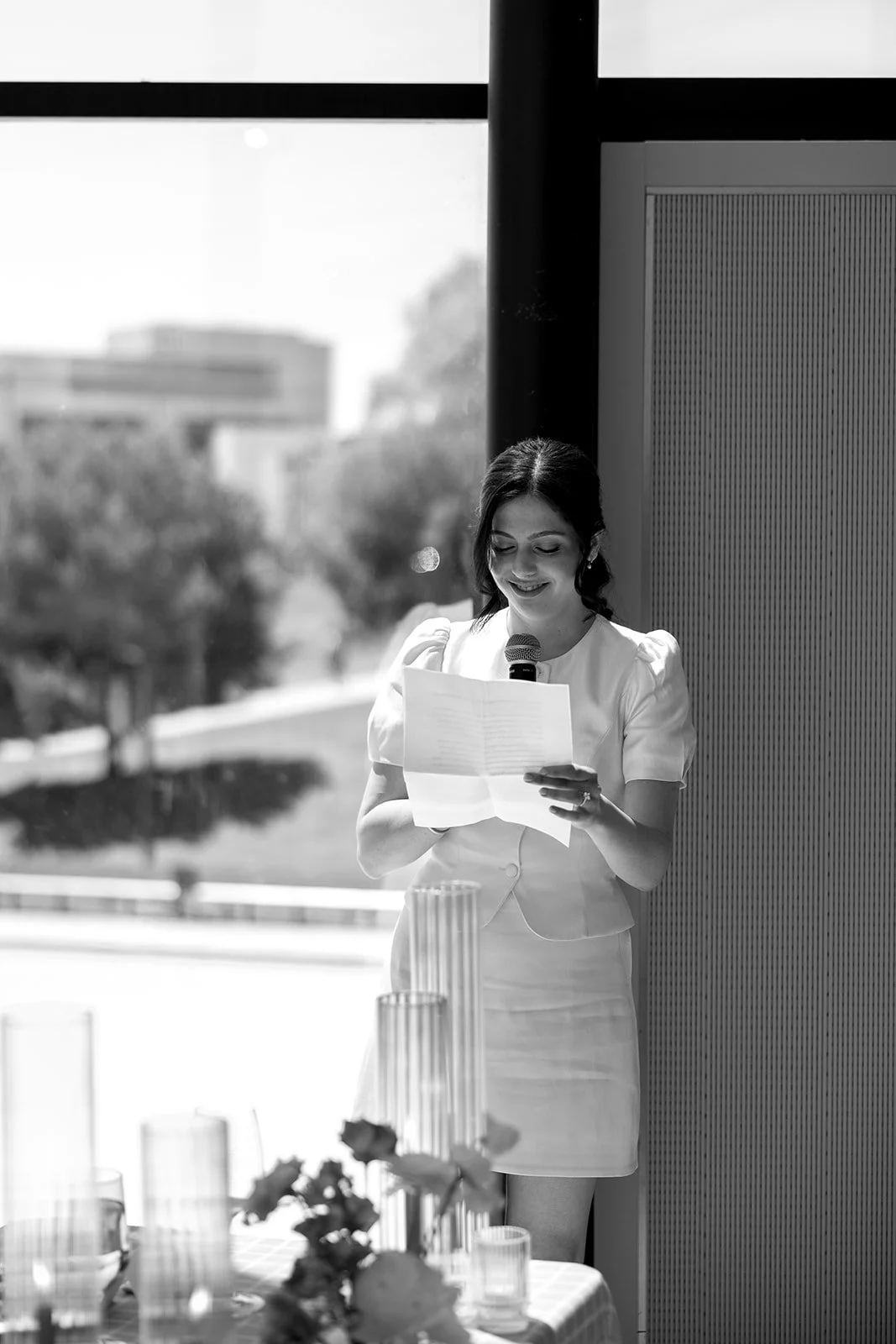  Bride thanks guests for coming to celebrate her at the bridal shower. 