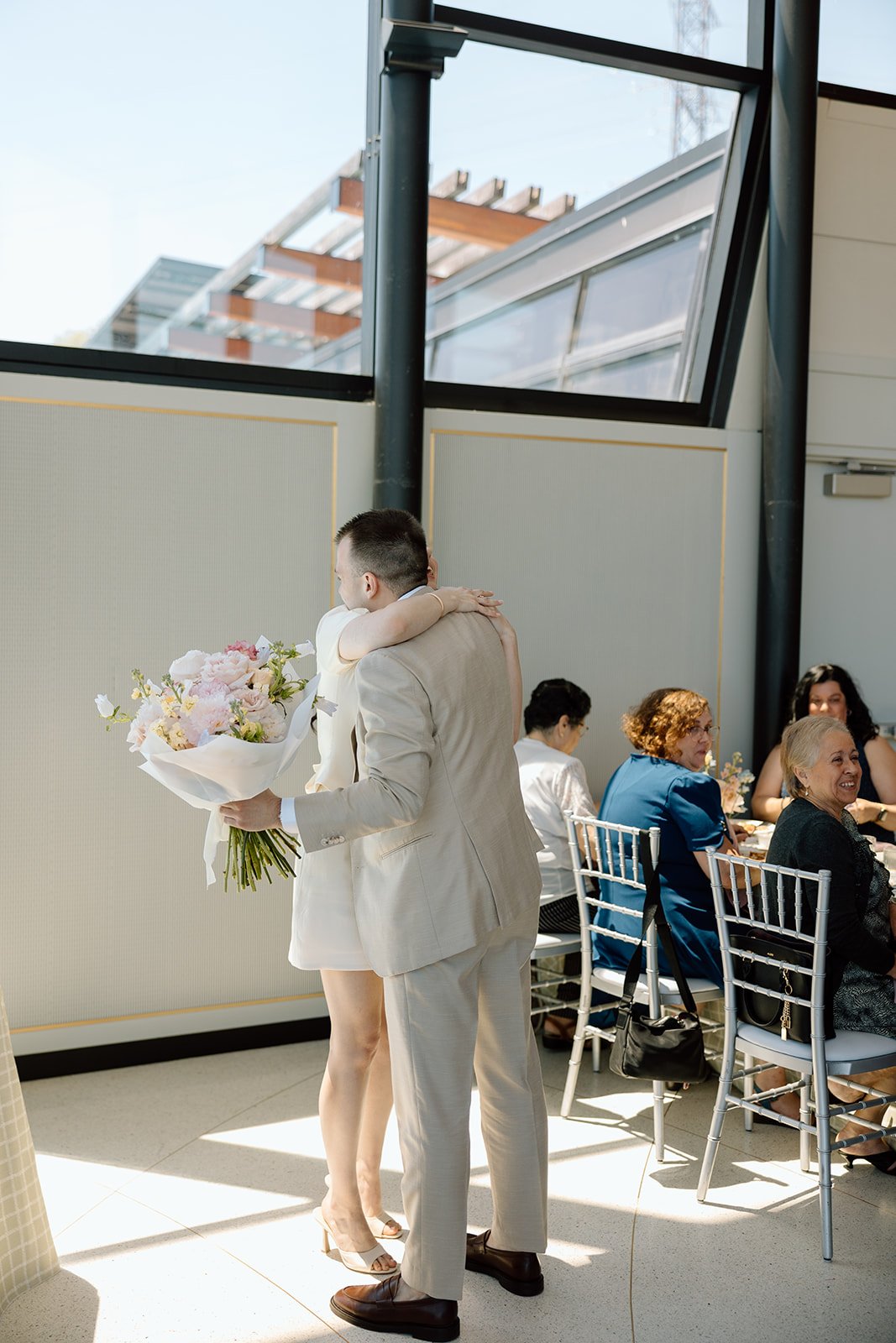  Groom comes to the shower with custom bridal bouquets for the bride and others. 