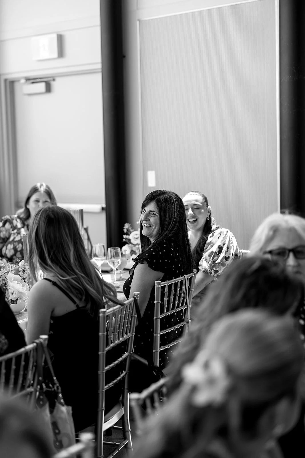  Guests walked into a room washed in natural light, surrounded by stunning Lake Ontario views and the romantic glow of ribbed glass hurricane candles. 