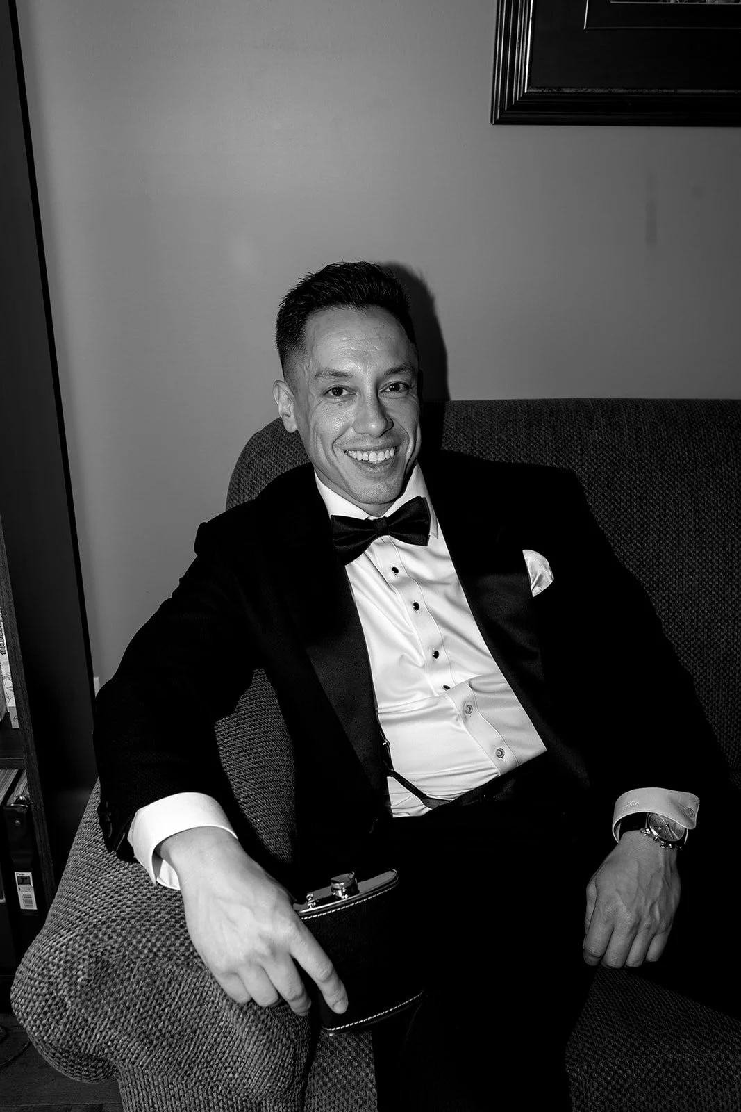  Classic white and black image of the Groom during his getting ready photos before the ceremony. 