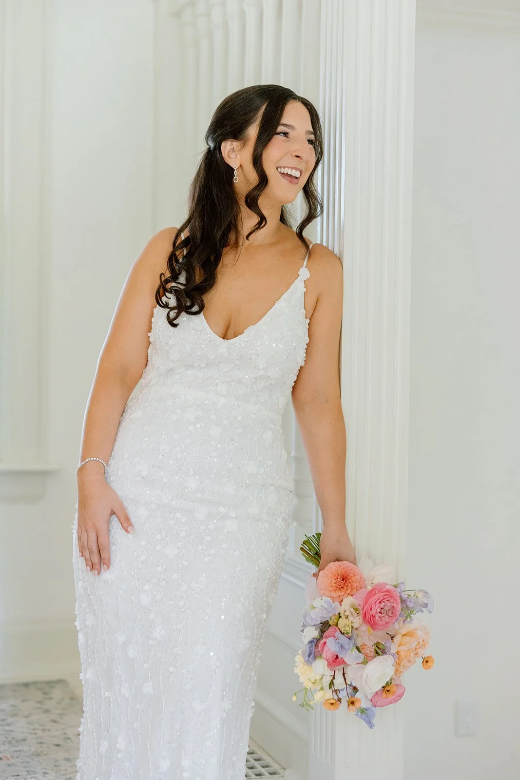  Bright and airy bridal prep photography by Paula Visco featuring a lace bridal gown on the Bride during her getting ready portraits. 