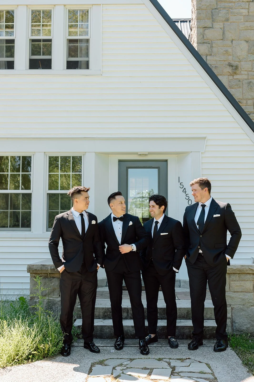  Groom and groomsmen in their custom tuxedos, during getting ready photos at Willowfarm House, Niagara on the Lake. 