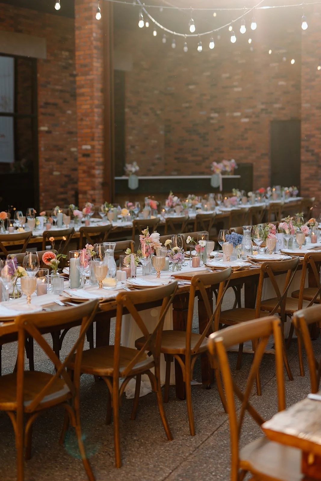 Golden hour winery wedding reception design in Niagara-on-the-Lake at The Hare Wine Co., designed and styled by Lindsay Plank Events and photographed by Paula Visco Photography. 