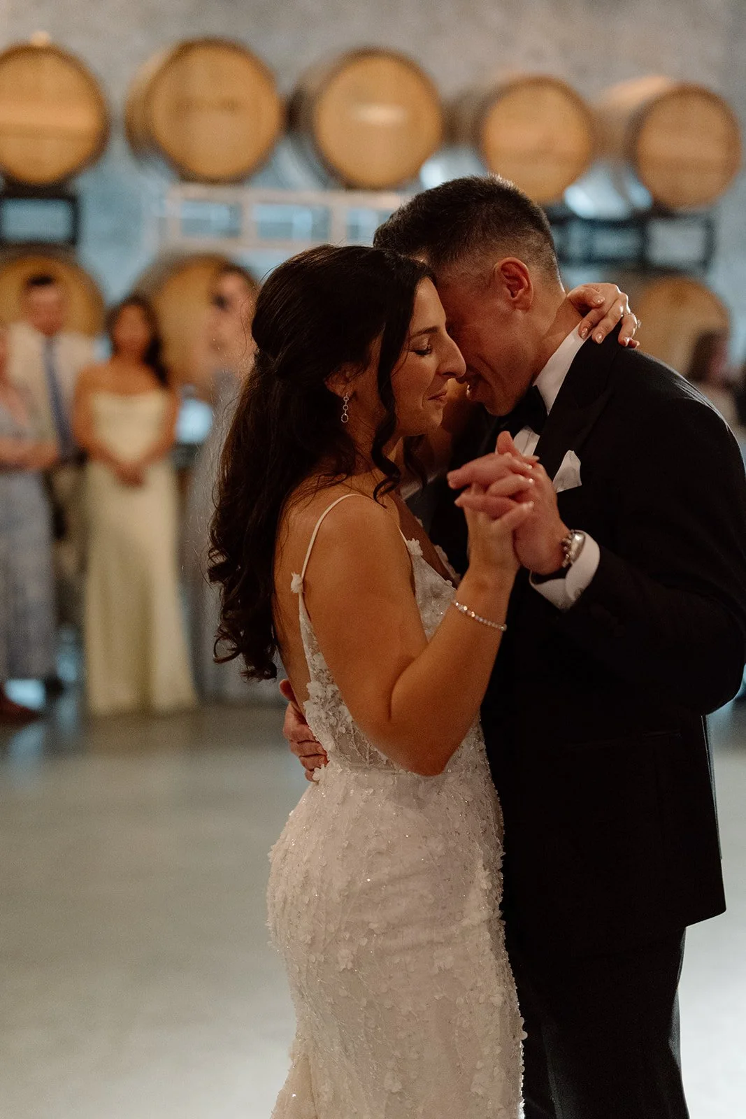  Bride and Groom share their first dance within The Barrel Room at The Hare Wine Co. 