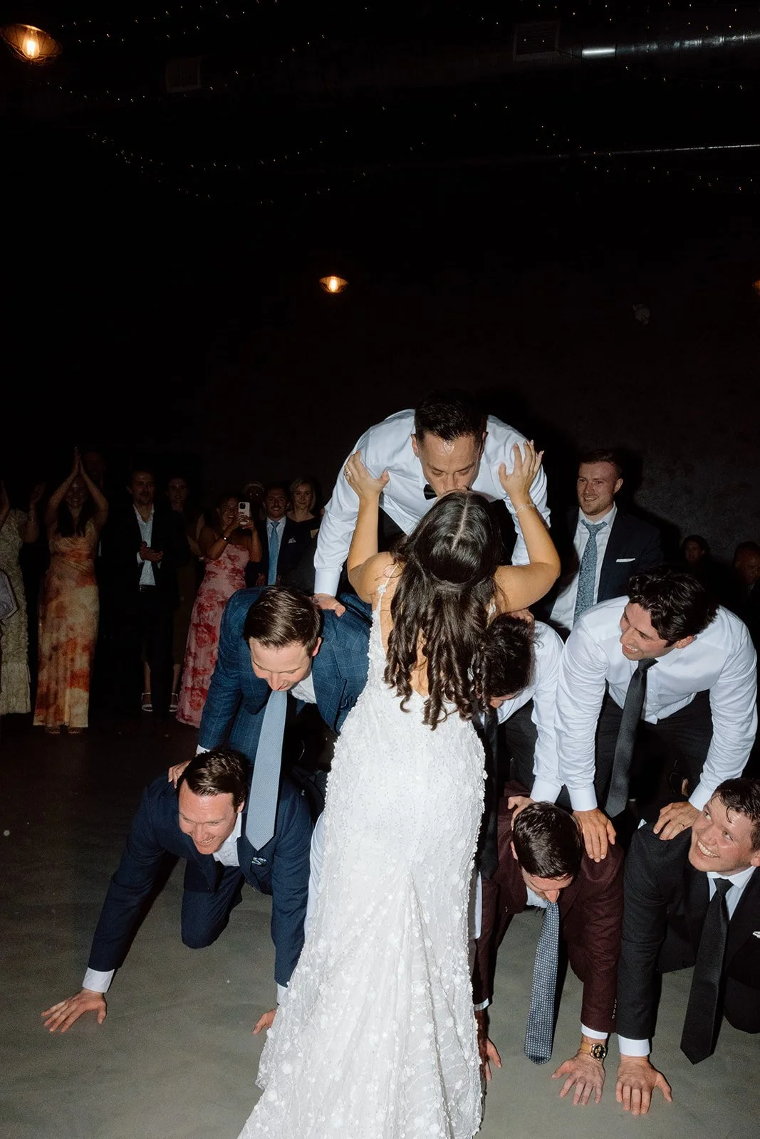  Bride and Groom share a kiss to close out the fun dance floor at The Hare Wine CO. 