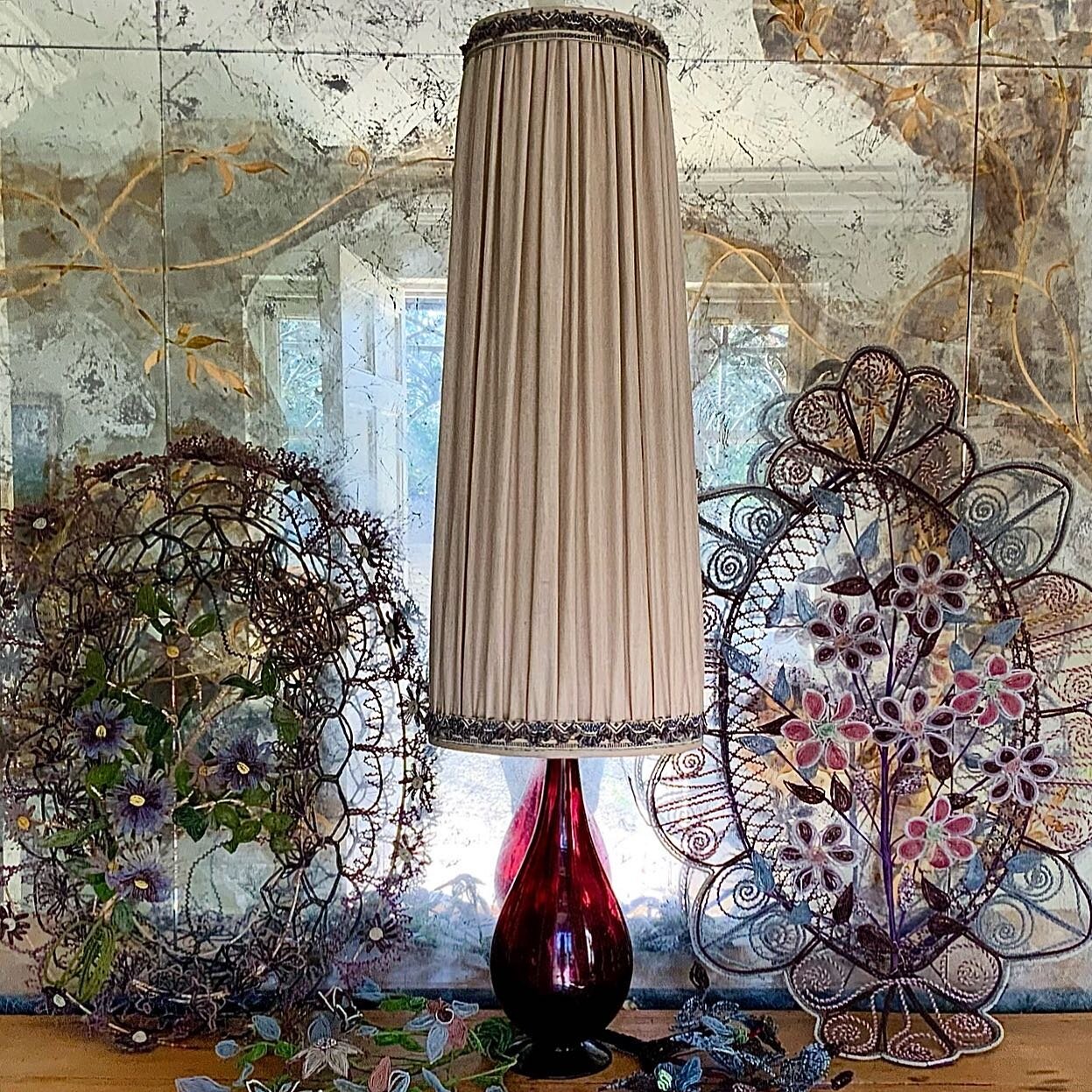 &bull;&bull;&bull;RECREATE&bull;&bull;&bull;
&bull;
Majestic tall lampshade with huge presence. Radiates the softest long pilar of the most beautiful light. 
&bull;
Seen here on an aubergine glass base. Natural linen lampshade edged with unusual anti