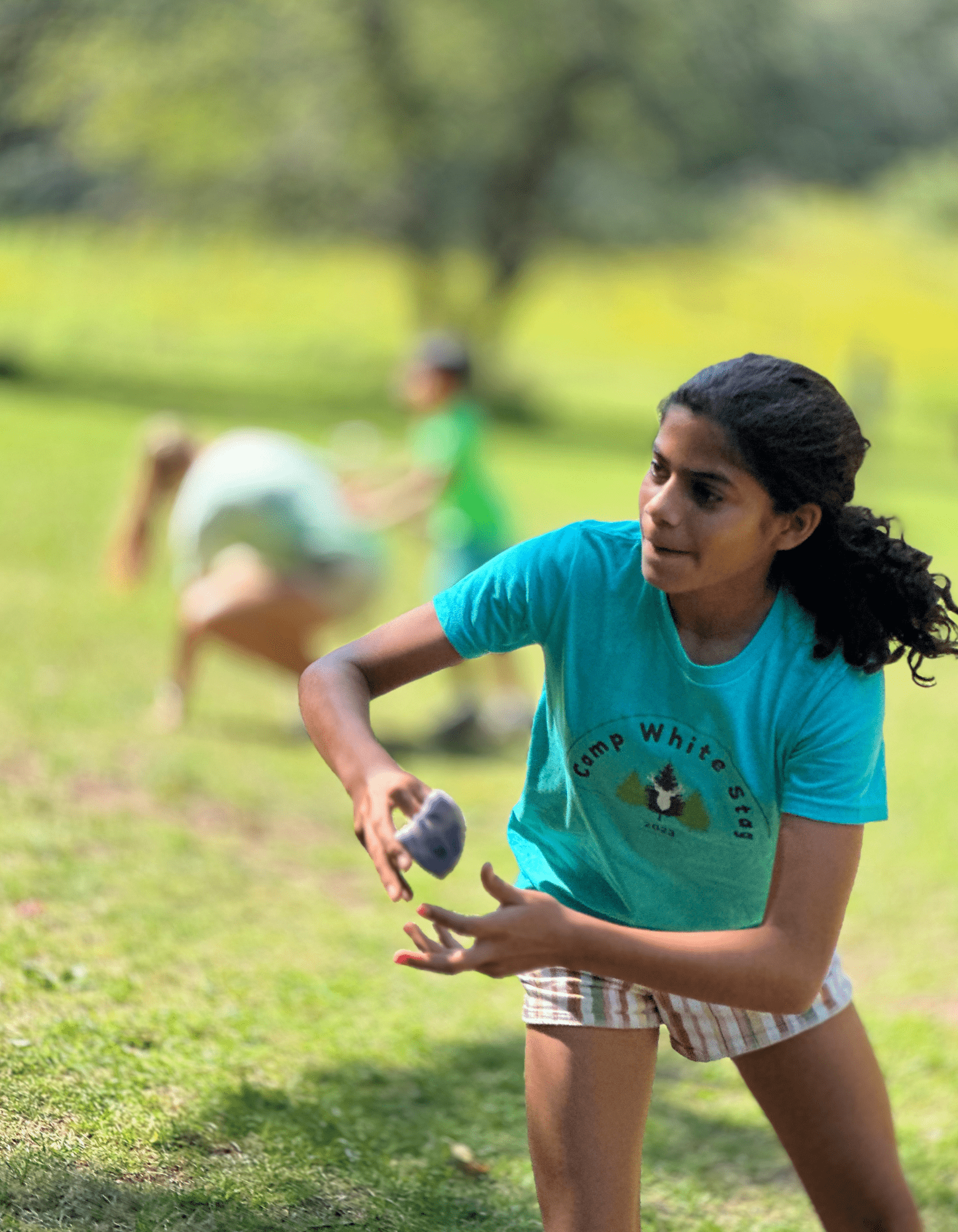 Kids_12-15_Camp White Stag_Girl Playing.png