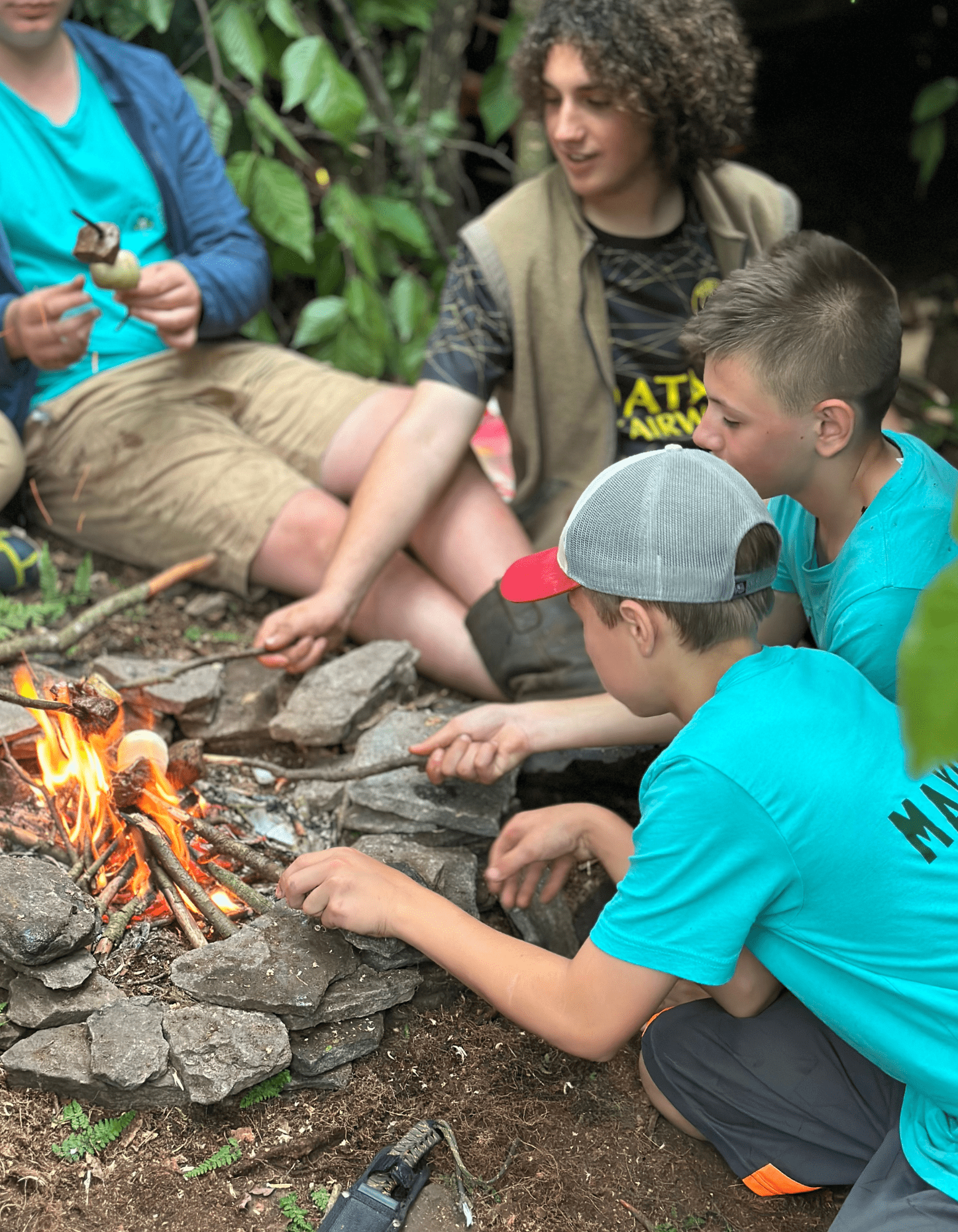 Kids_12-15_Camp White Stag_Boys by Fire.png