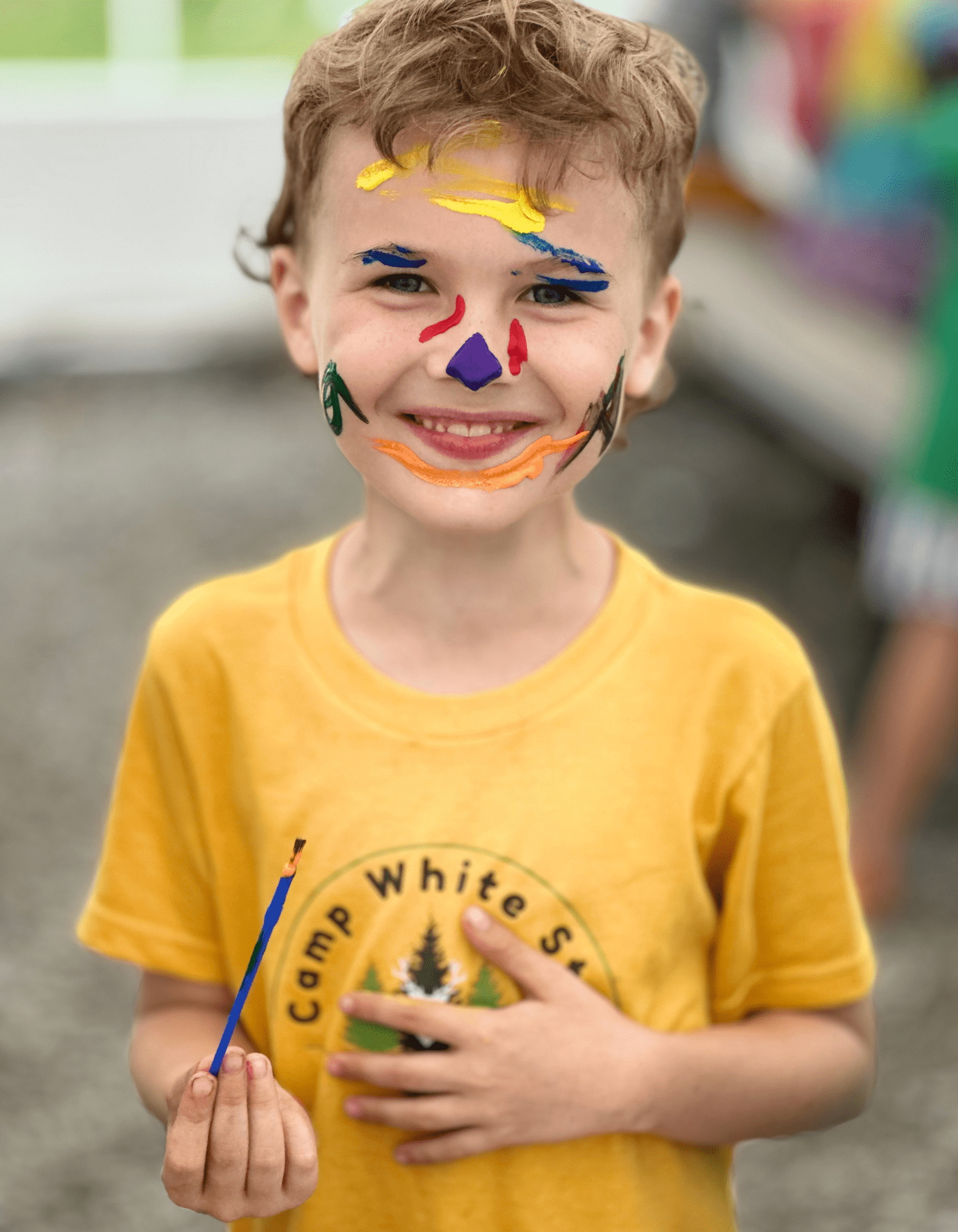 Camp White Stag_Boy with Face Painted.png