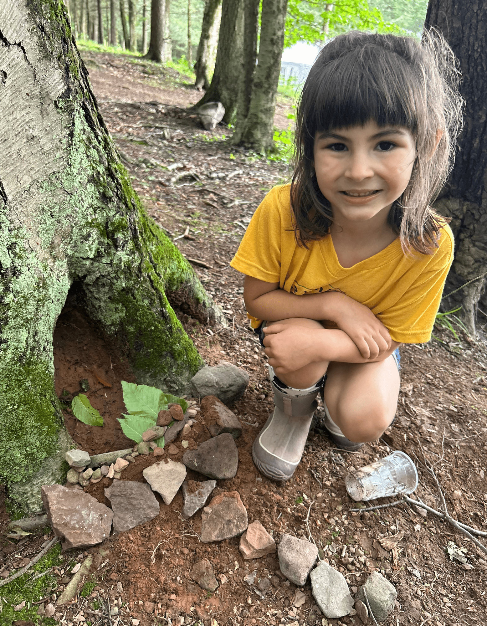 Camp White Stag_Girl + Rocks.png