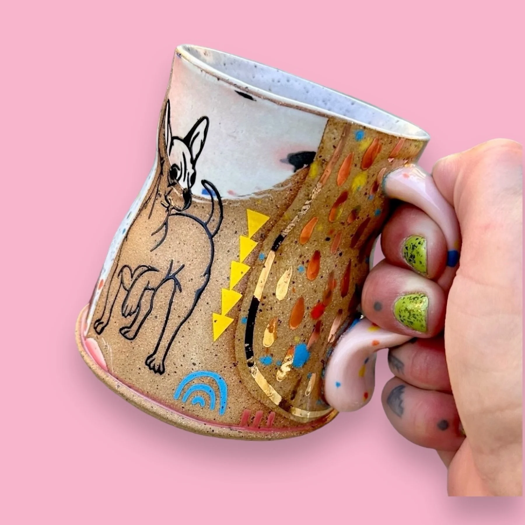 4. DIDEM MERT_Bling Chi Collage Mug_2024_4.5_x3.5_x4__Mid-range stoneware, mid-range porcelain, underglazes, glazes_fired to cone 5 OX. (electric), lustre, fired to cone 018 OX. (electric).JPG