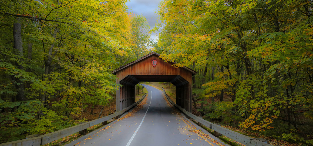 A wooden bridge over a scenic road in Michigan