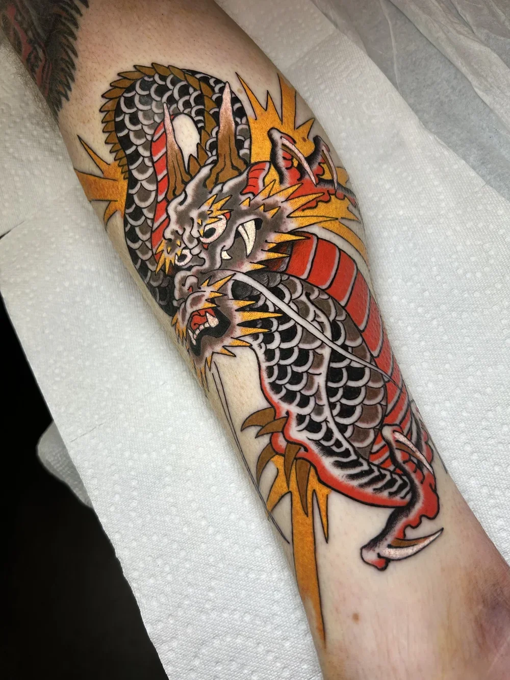 Dragon tattoo Rive-Sud