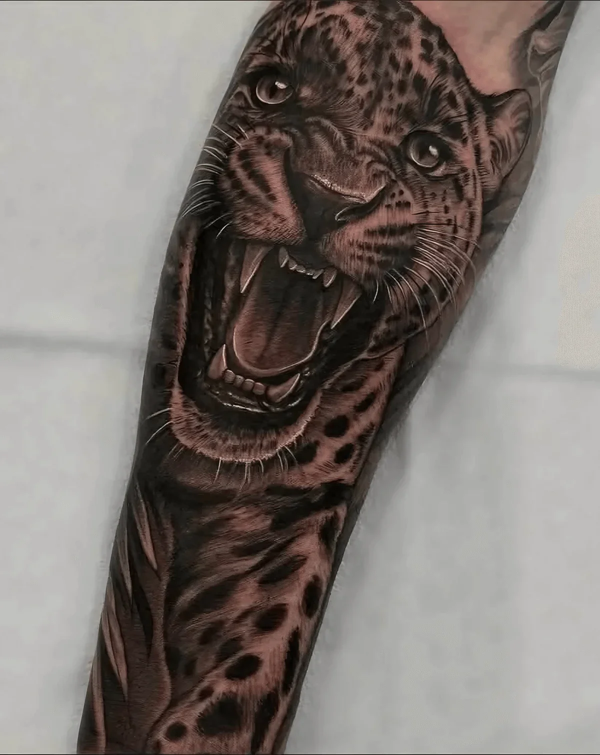 Black and grey realism tattoo Longueuil