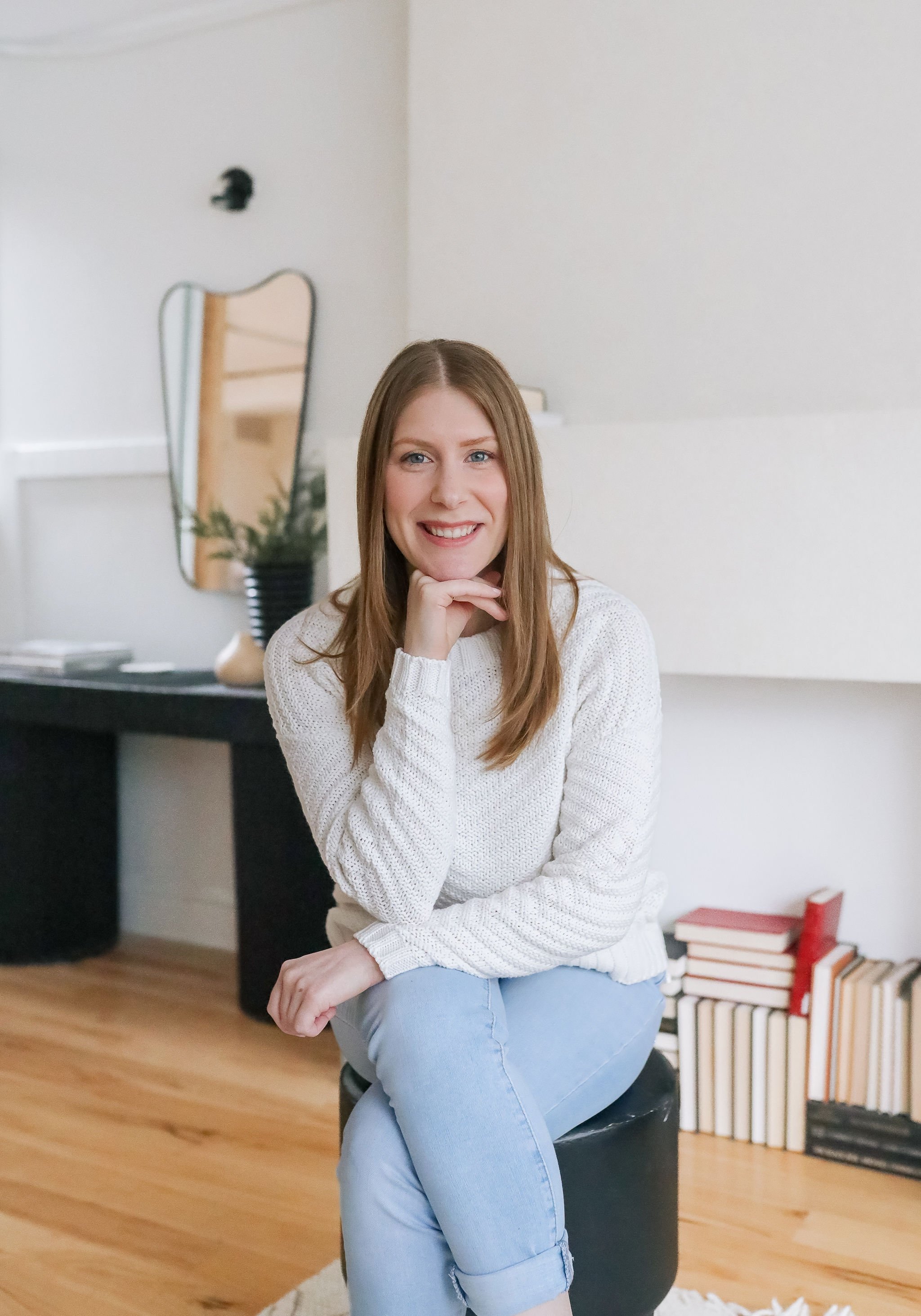 Kate Bailey, a York Region-based Registered Social Worker and founder of Anchor Point Therapy, smiling in a professional setting.