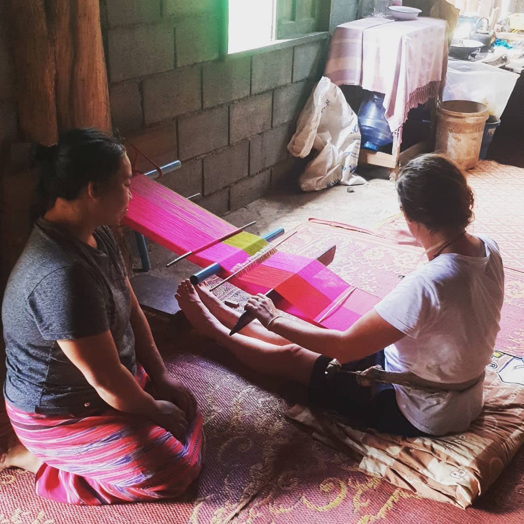 weaving with women in Thailand.jpeg