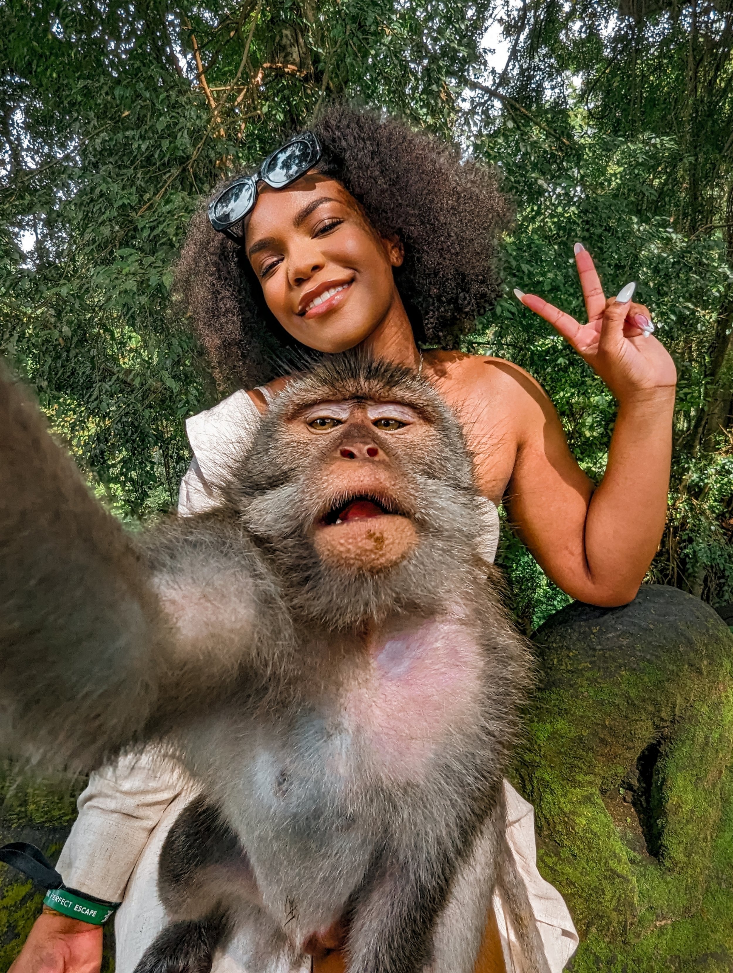 Black solo female traveler with greether in Bali, Indonesia