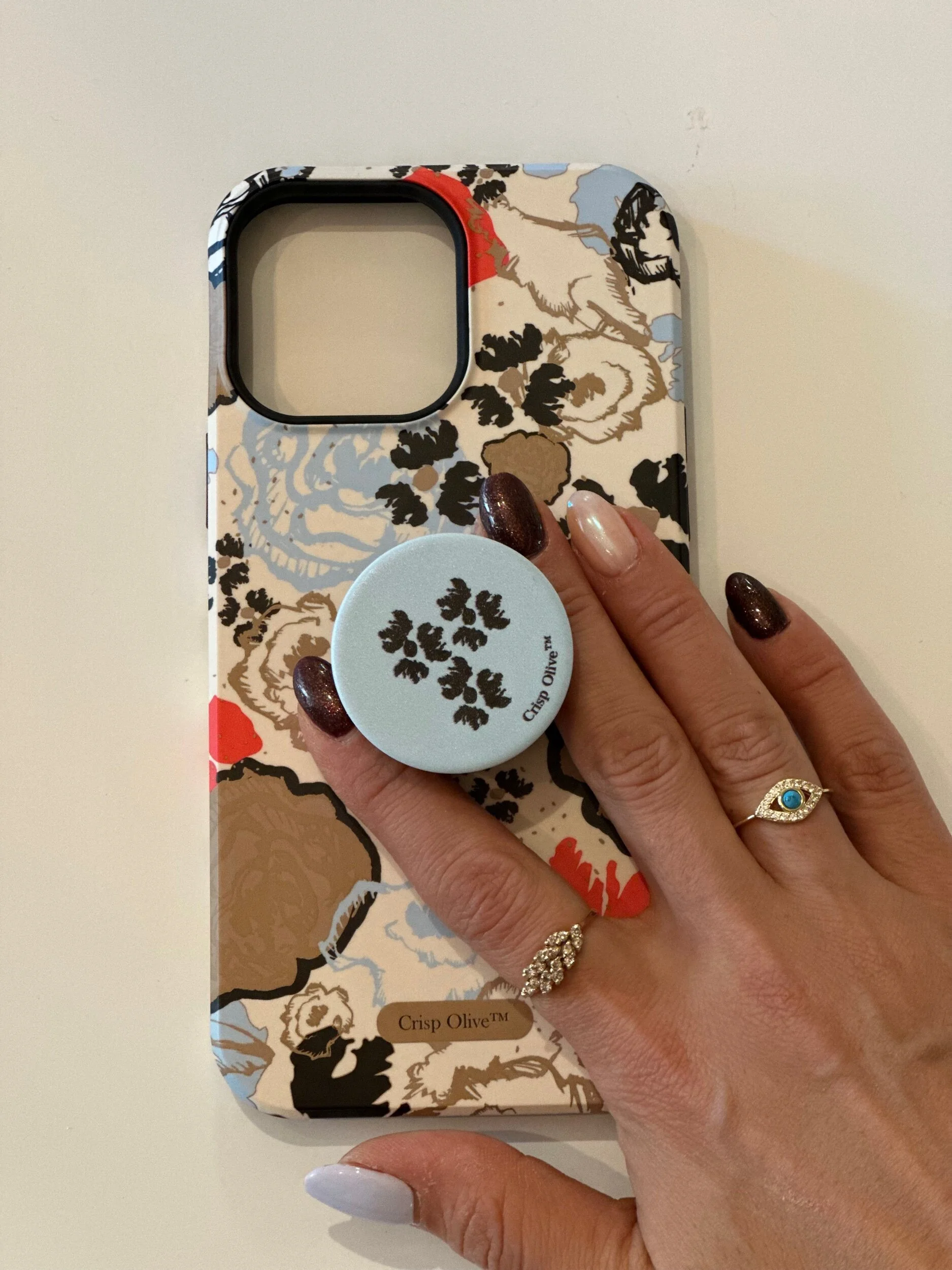 Phone protection with style with Crisp Olive's custom-designed 'Pop Sockets' phone grips. Lightweight, made in U.S.A, a unique gift or a fashionable phone accessory.