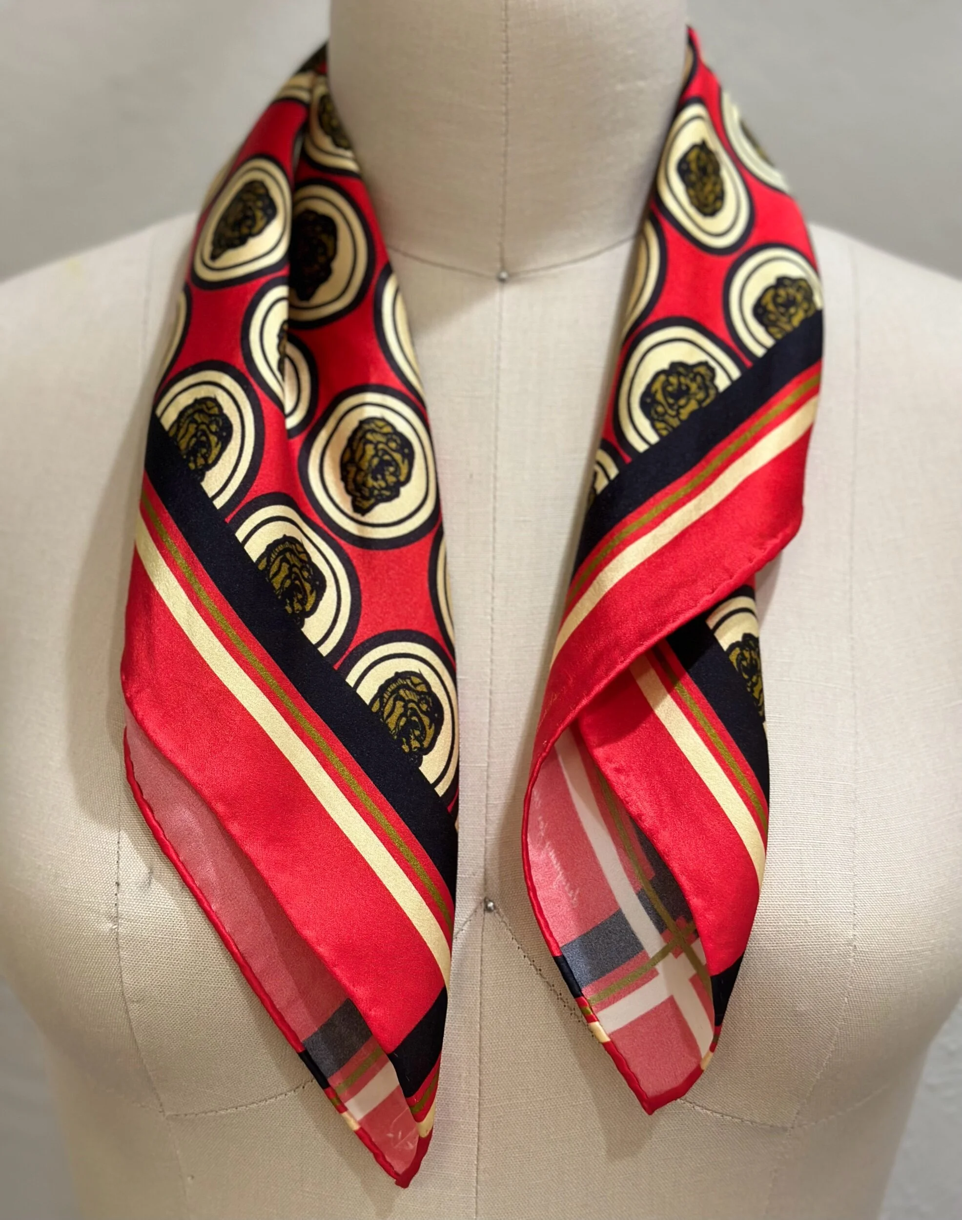 A gorgeously patterned 100% silk scarf, designed by Crisp Olive™ Studio. A luscious red background and gorgeous olive and gold accents. A fashion statement to style up outfits instantly.