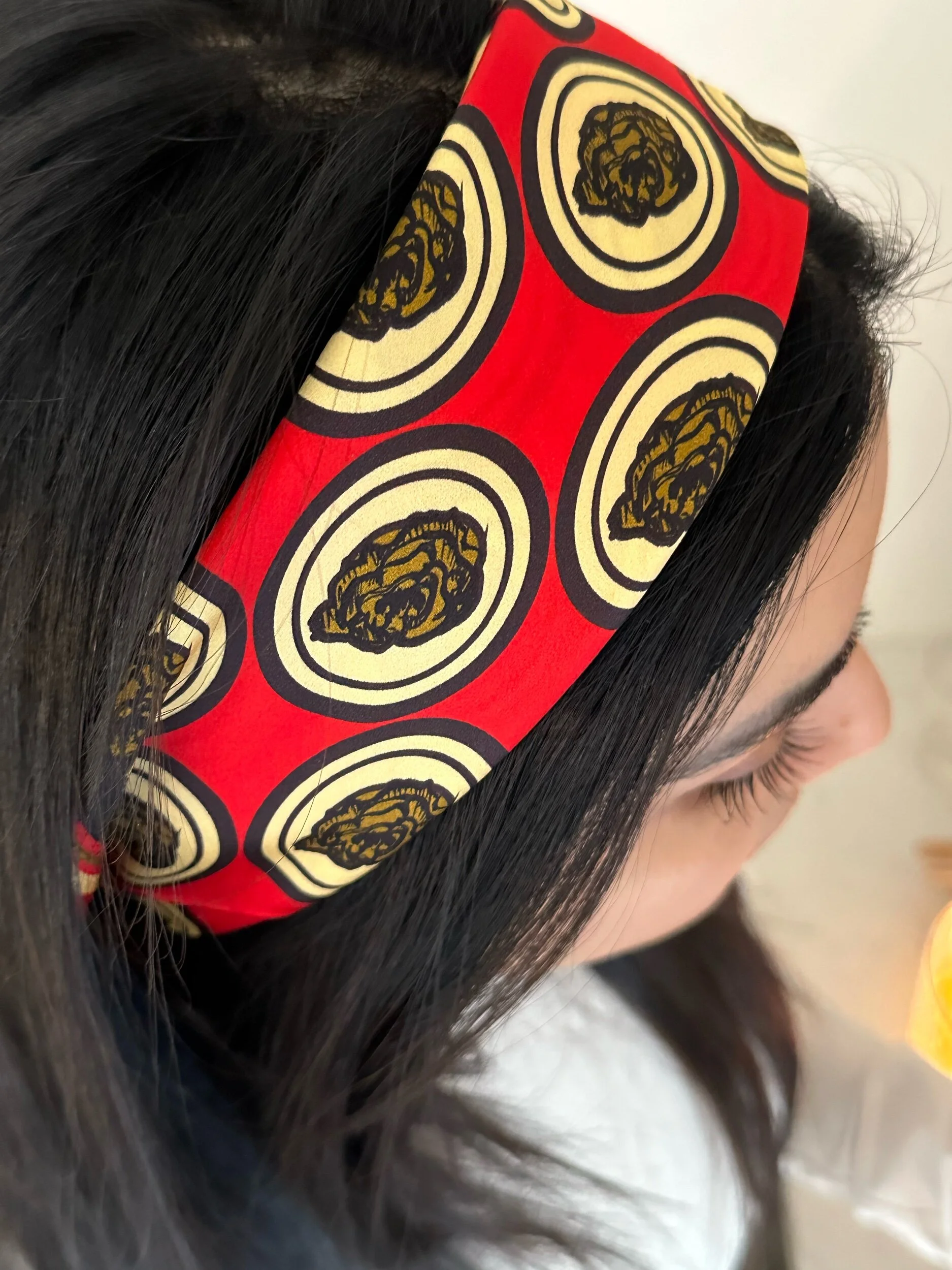A gorgeously patterned 100% silk scarf, designed by Crisp Olive™ Studio. A luscious red background and gorgeous olive and gold accents. A fashion statement to style up outfits instantly.