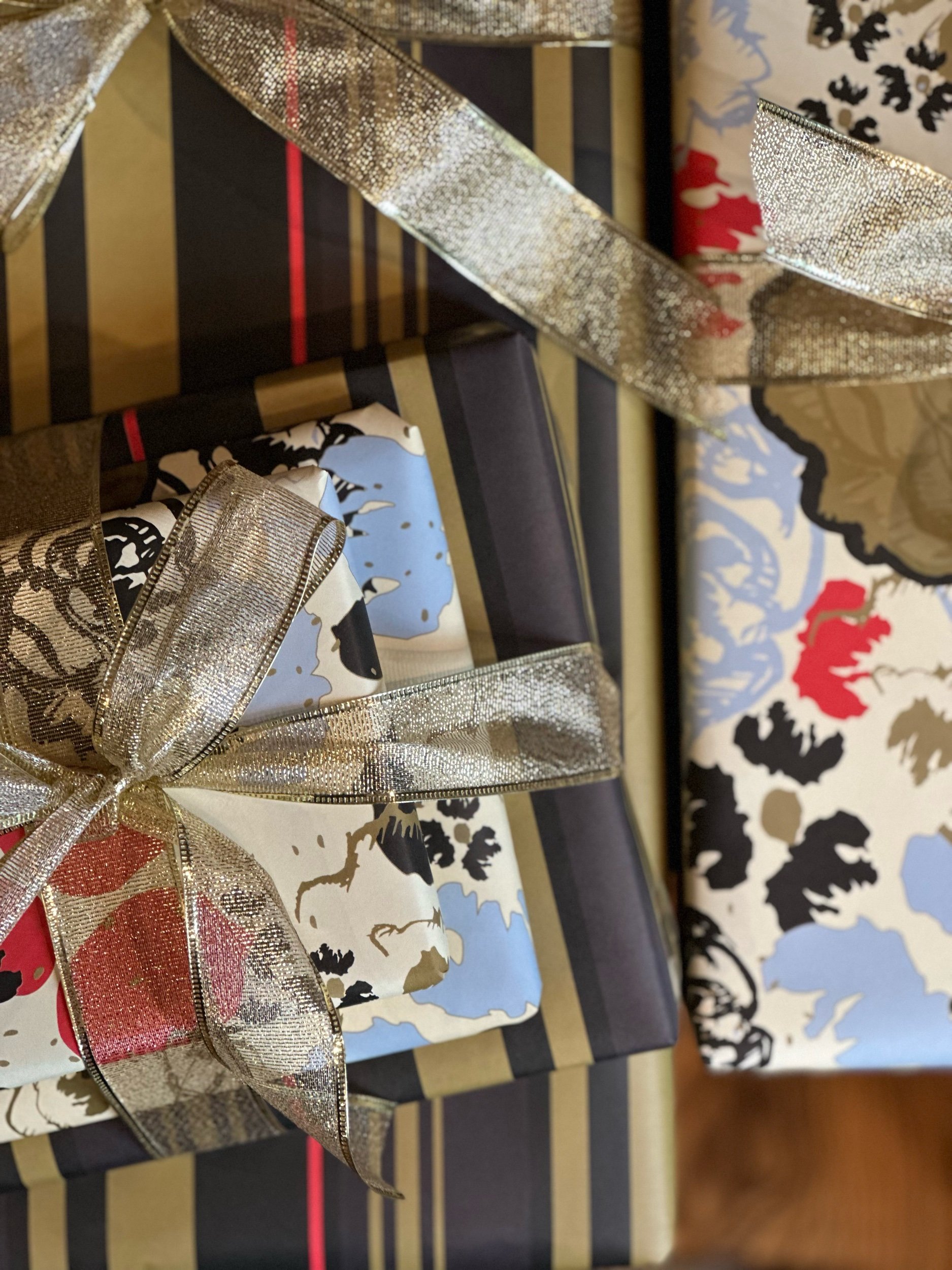 presents wrapped with double sided floral and stripes gift wrap sheets.jpeg