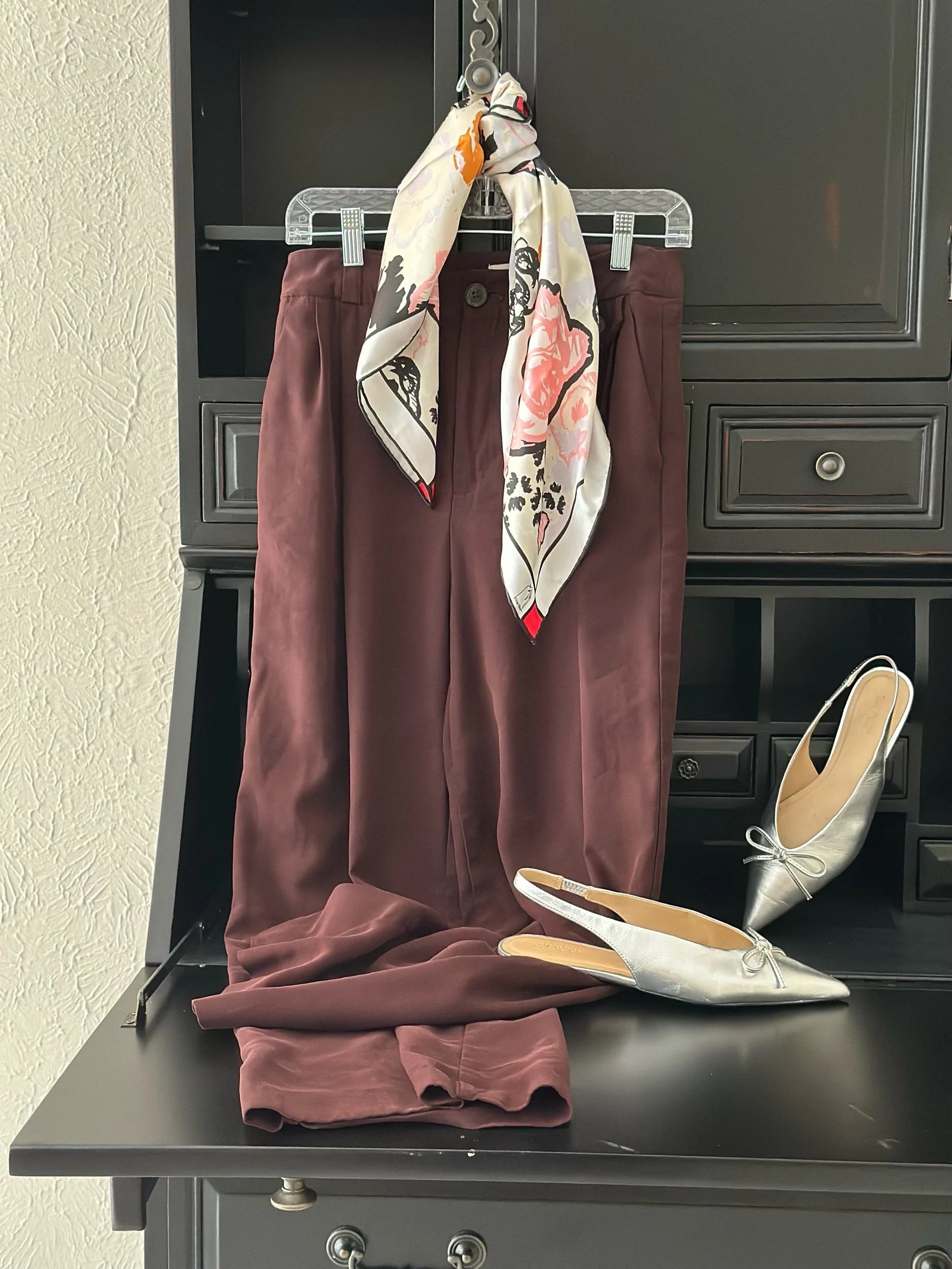 Sophisticated, artist designed pure silk scarf with an all over floral pattern in dusty pink, creme, light orange and classic black colors.