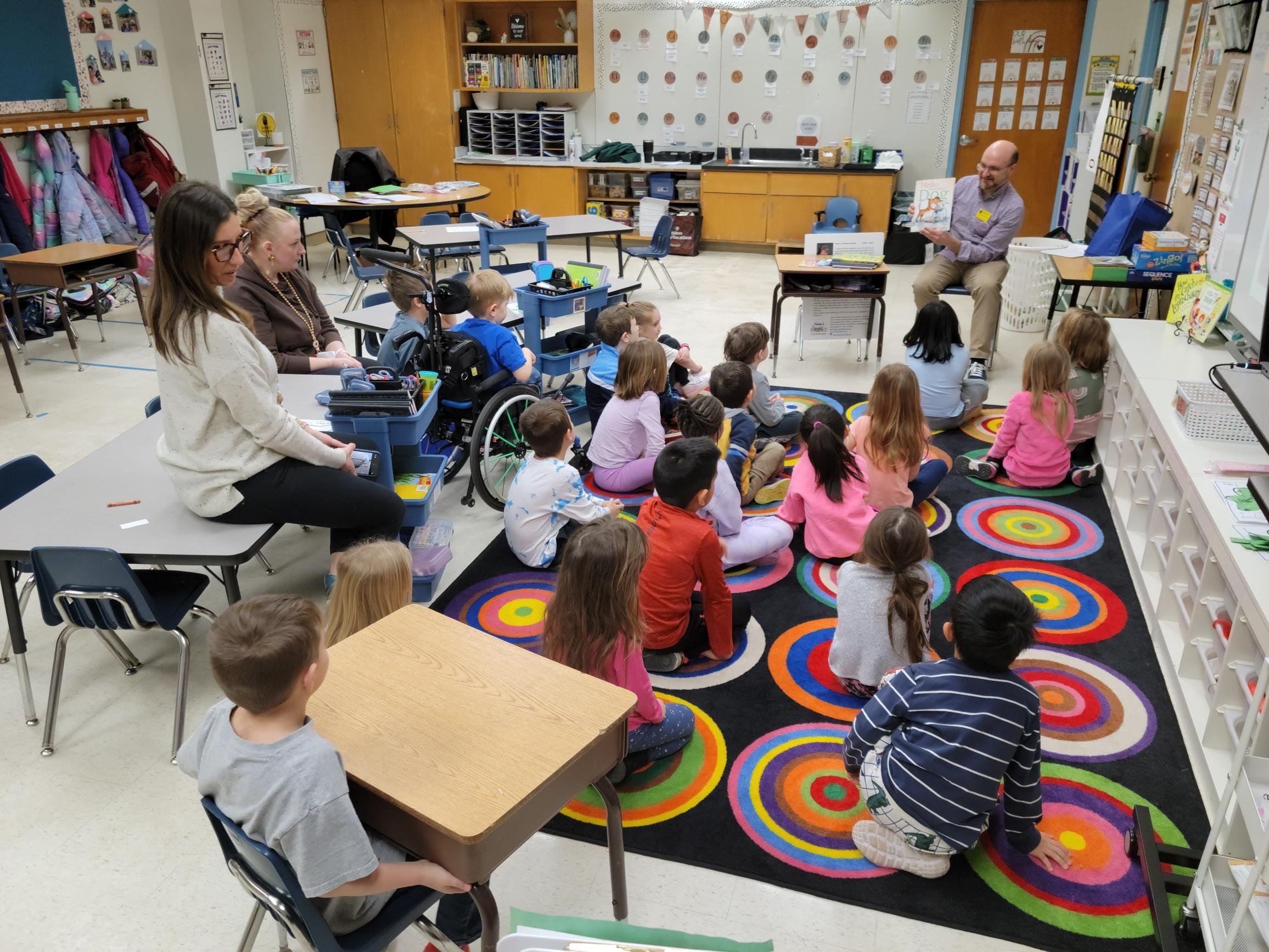 Craig reading to students in William classroom.