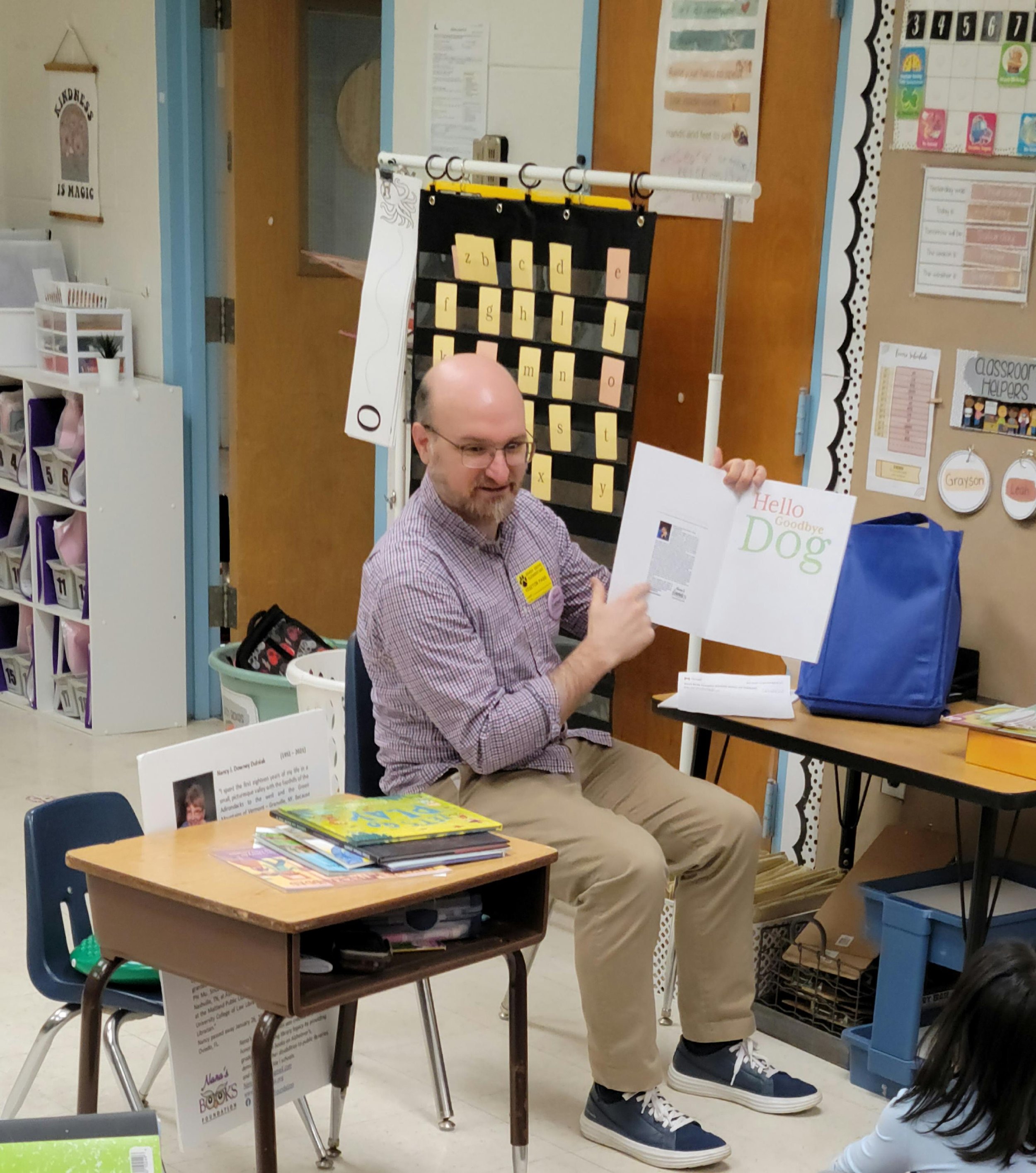 Craig Dulniak, Nana’s Books Foundation founder and board member, reads Hello Goodbye Dog with students at Shady Grove Elementary School in Ambler, Pennsylvania.