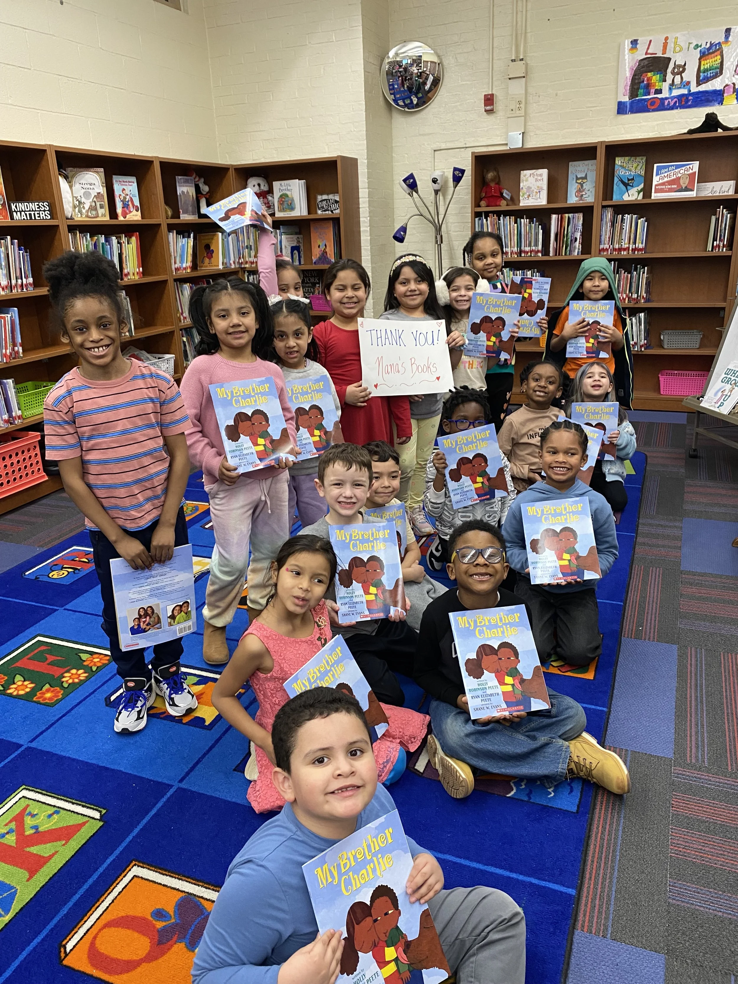 Owings Mills Elementary School children with books donated from Nana's Books Foundation