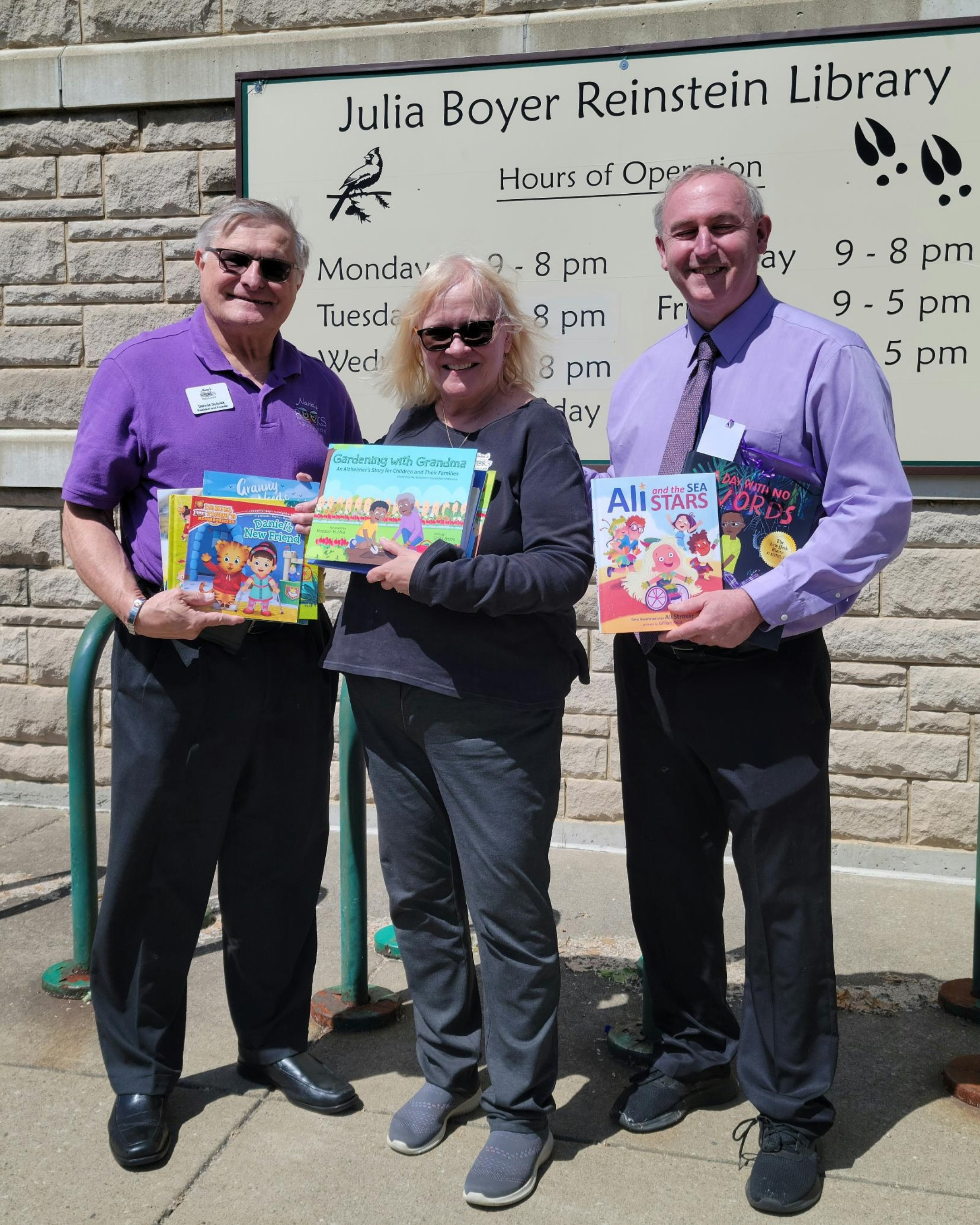Dennis Dulniak, Cathy Goodrich and Dan Caufield, Director Julia Boyer Reinstein Library, Cheektowaga