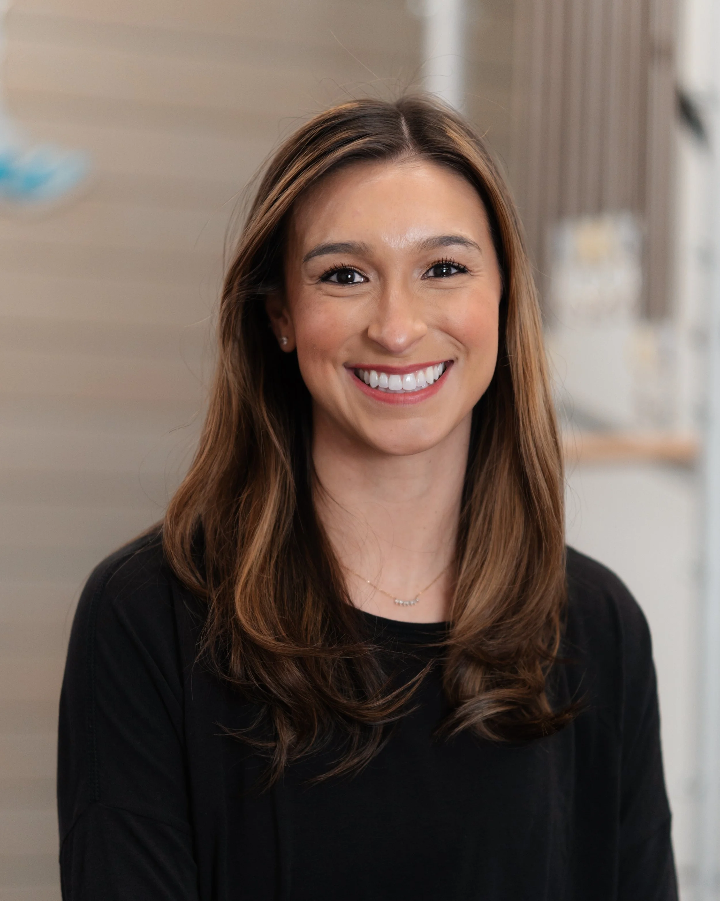 A photo of Lauren Patton, an instructor at The Source Pilates.