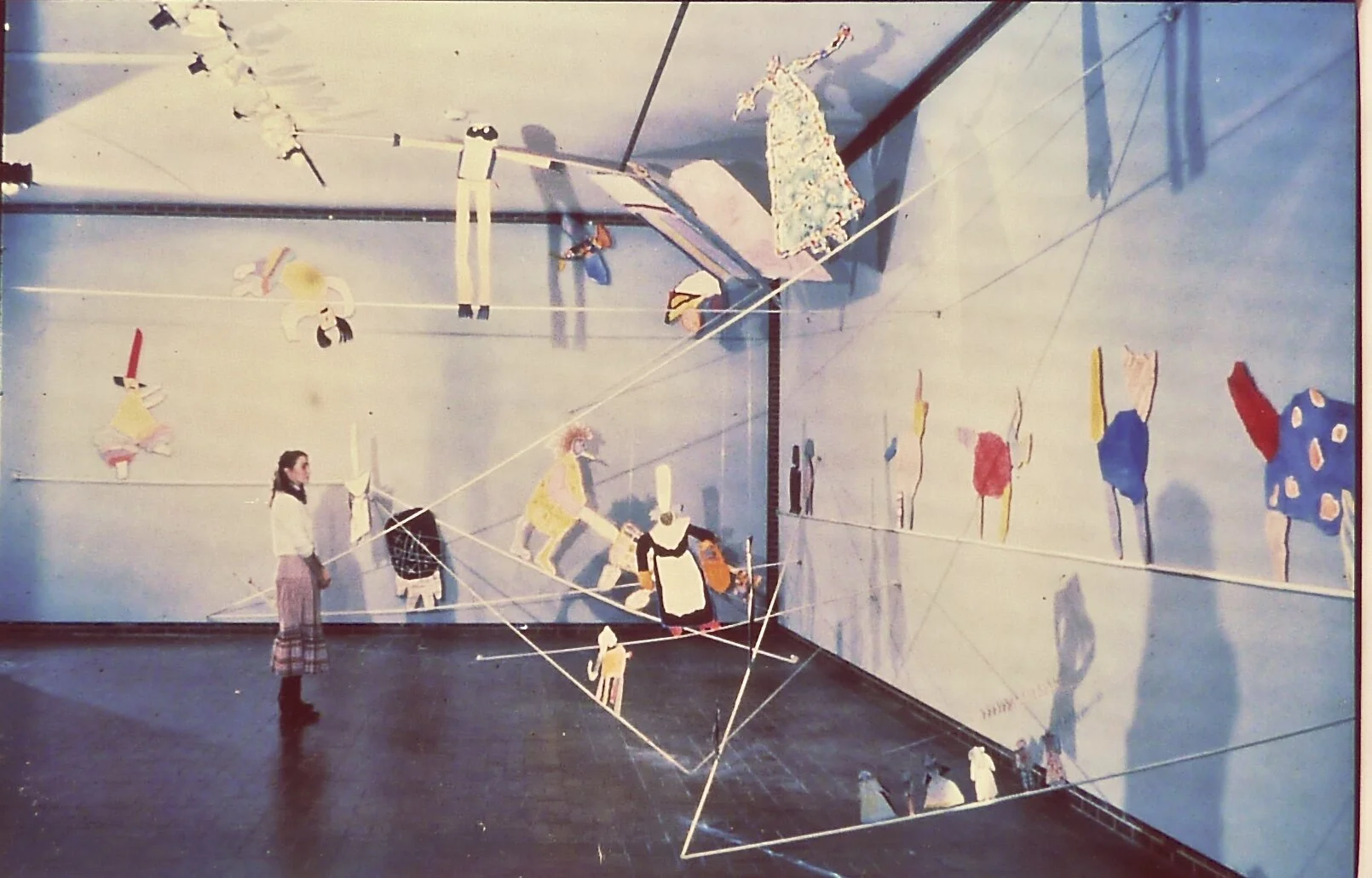 Seven Artists, 1981, Newberger Museum, Purchase, New York, mixed media cut-out figures attached to tightropes