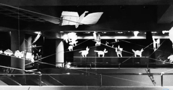 A Balanced World, Squibb Gallery, Princeton, New Jersey, 1979, mixed media cut-out figures attached to tightropes, 400’x 400’