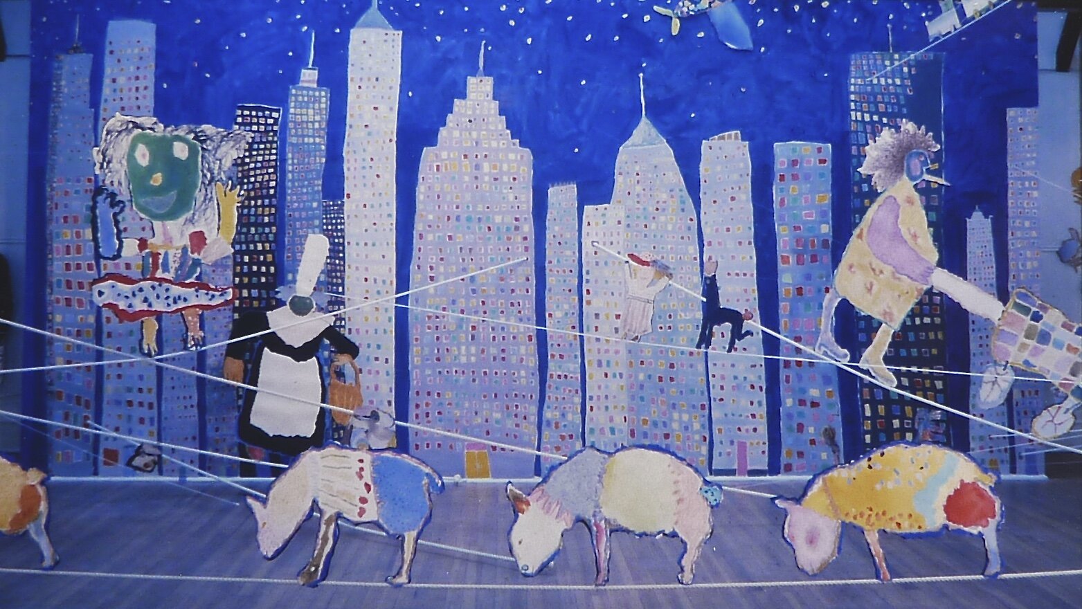 Matinee Voleu, Silvermine Center for the Arts, New Canaan, Connecticut, 1983, mixed media cutout figures attached to tightropes, 20” x 66”