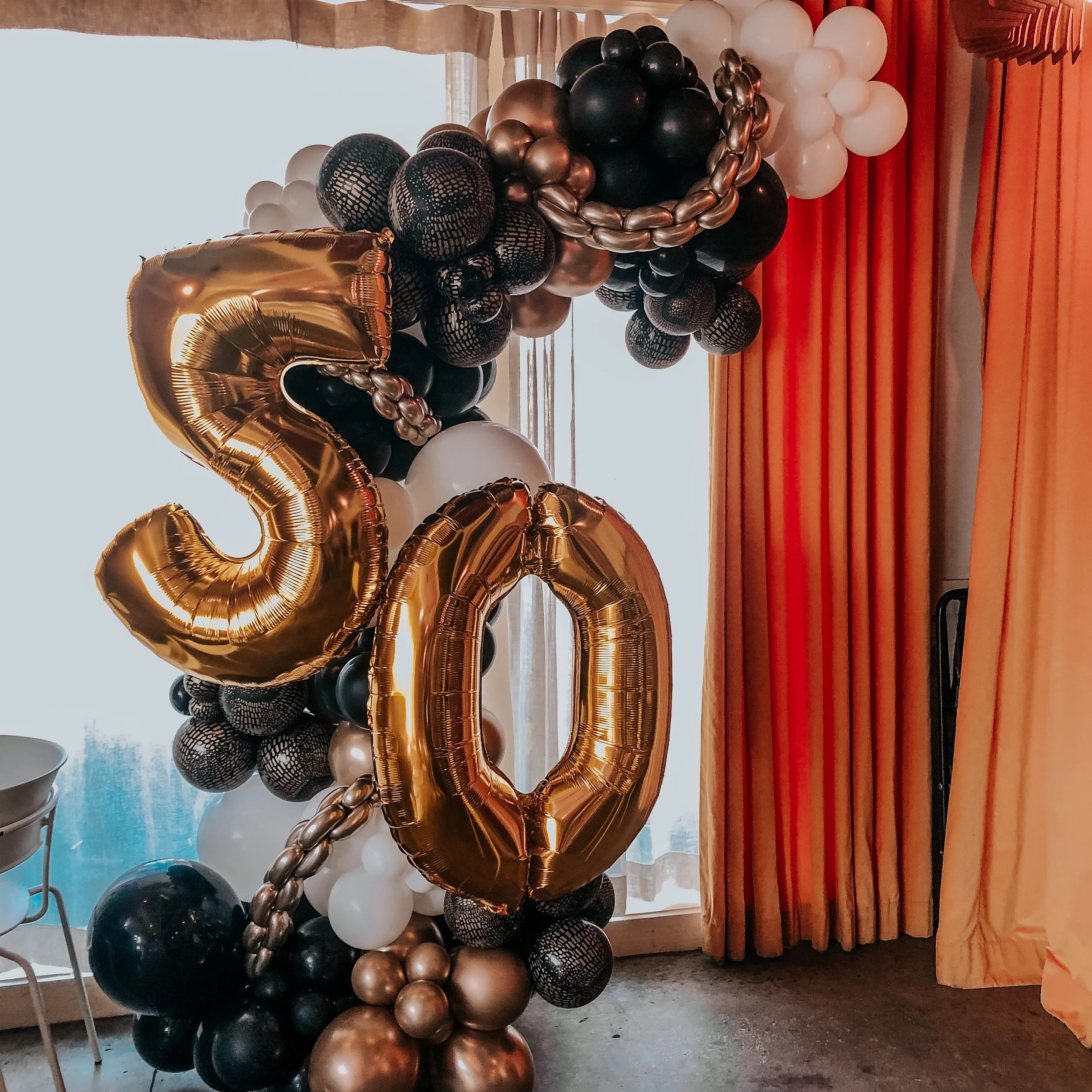 14ft worth of Balloon Garland + Designers touch add-ons (on stand)