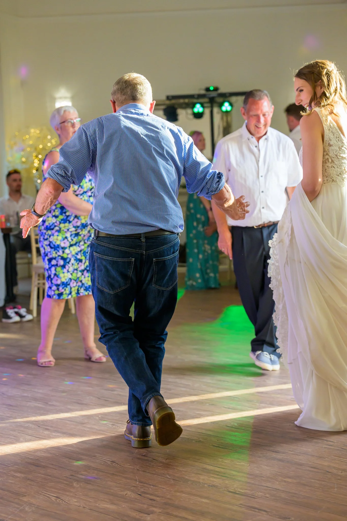 Wedding guests dancing on the dance floor
