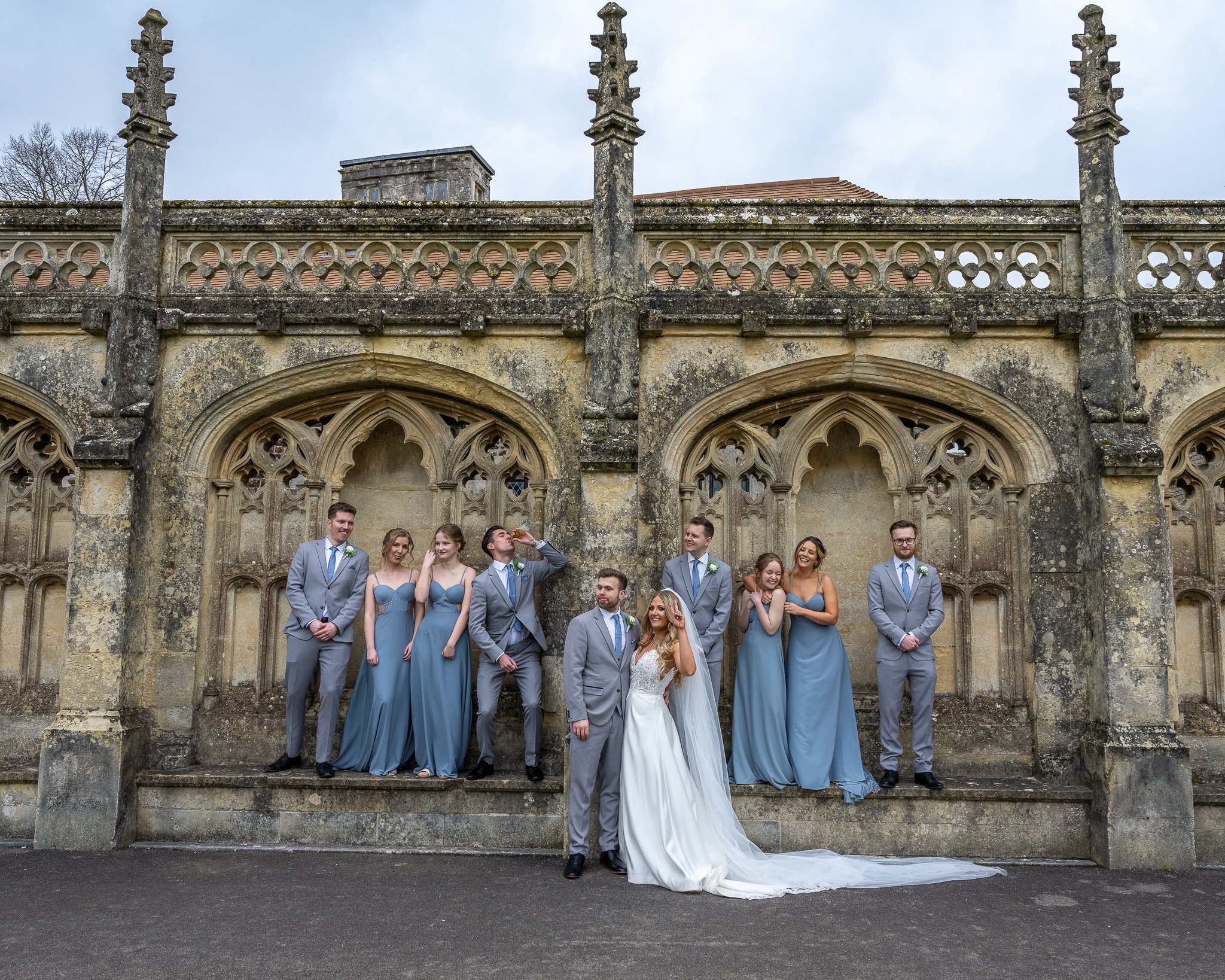 Dorset wedding photographer Canford School bridal party having fun