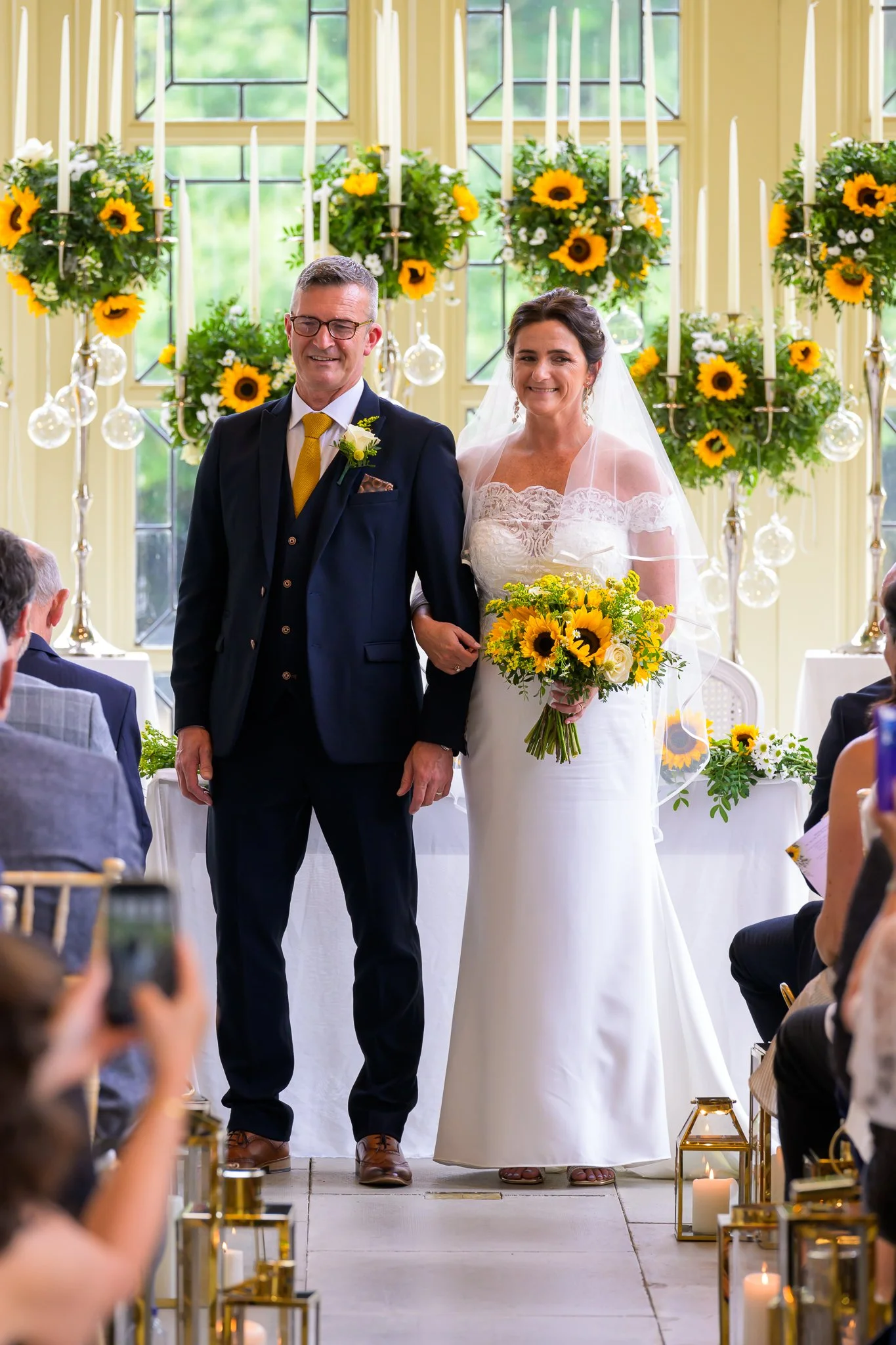 Bride and groom stood in their wedding venue ready to say their vows