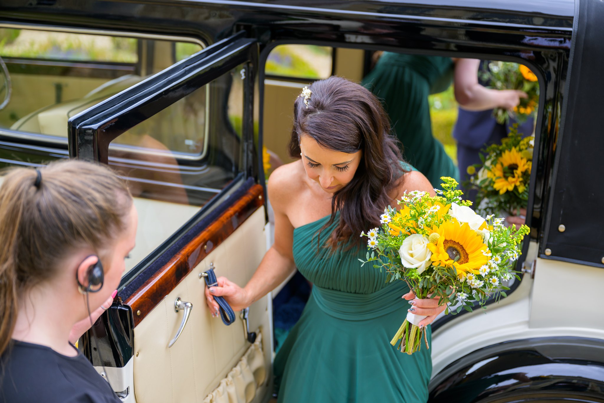 Bridesmaid leaving the wedding car