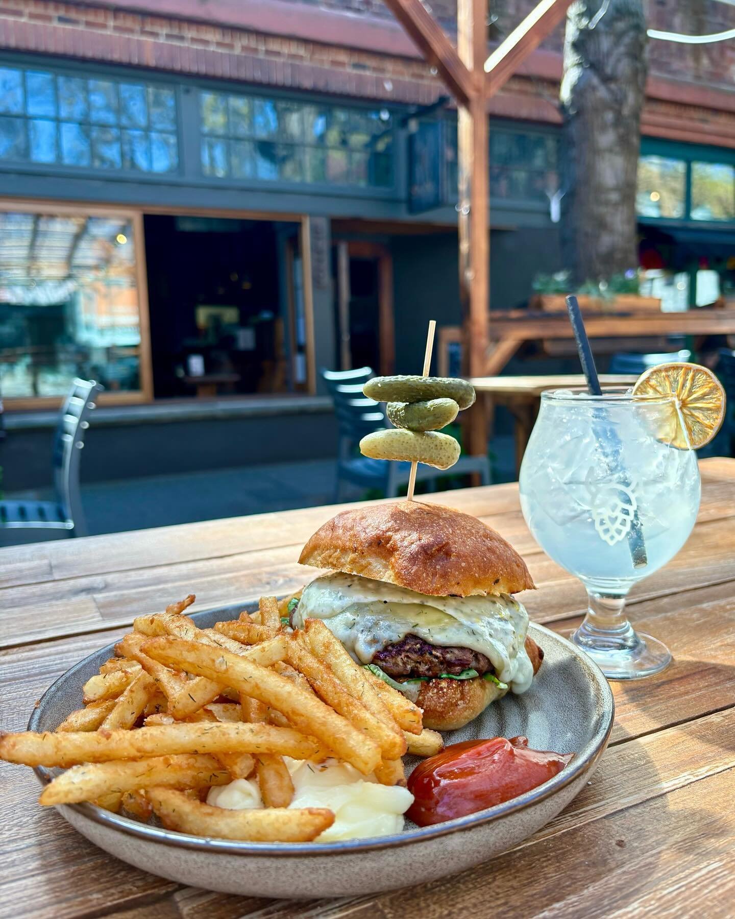 Weekend Special! Come try our prized pickle burger! Our house lamb &amp; beef patty topped with dill havarti cheese, cucumber salad, arugula, &amp; tartar sauce. We paired it with one of our new spring cocktails, the Victory &amp; Valor, which is a l