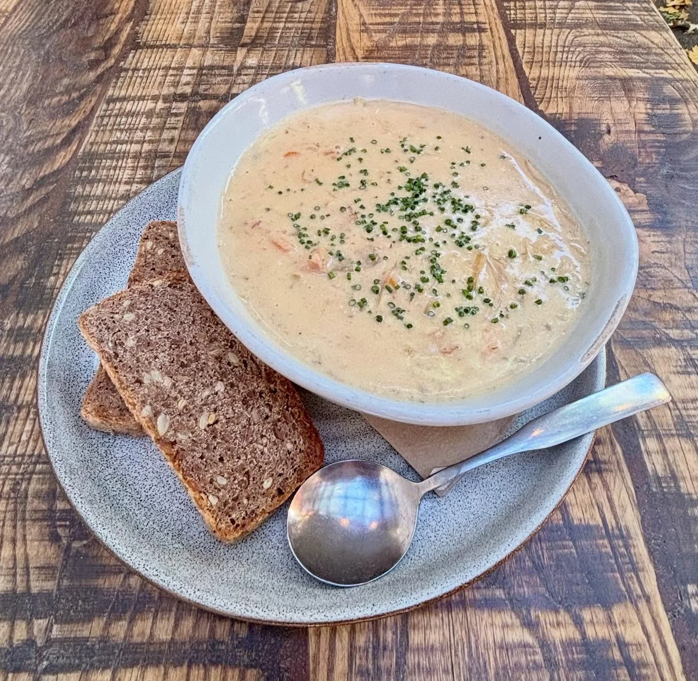Fiskesuppe is Back! Traditional Norwegian 🇳🇴 fish soup with salmon, cod, potatoes, &amp; fresh vegetables all simmered in a creamy miso broth with a side of toasted rye bread. Available as a cup or bowl.
