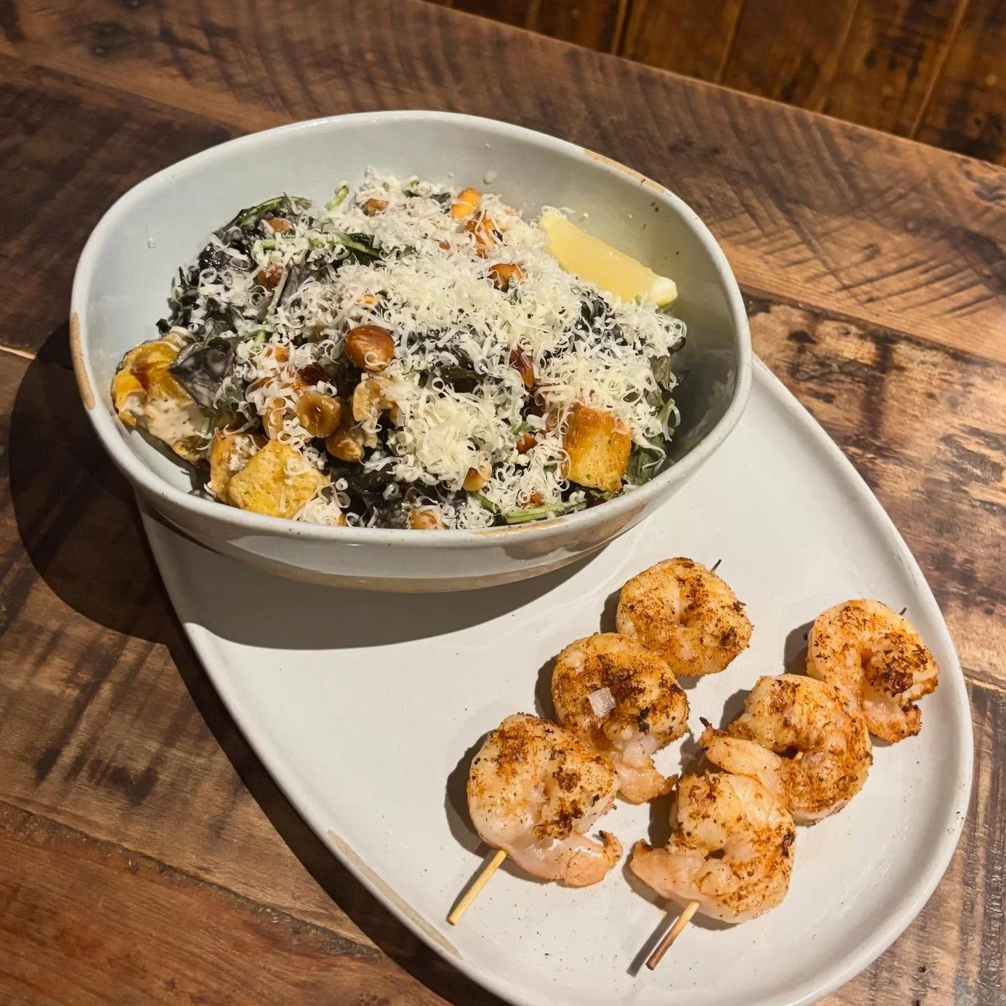 Introducing Ullr&rsquo;s Kale Caesar Salad &amp; Grilled Shrimp! 🍤 Already a staff favorite, the caesar has tender delicata squash, toasted hazelnuts, &amp; croutons tossed in a zesty caesar dressing &amp; topped with grated gruyere. Add the grilled