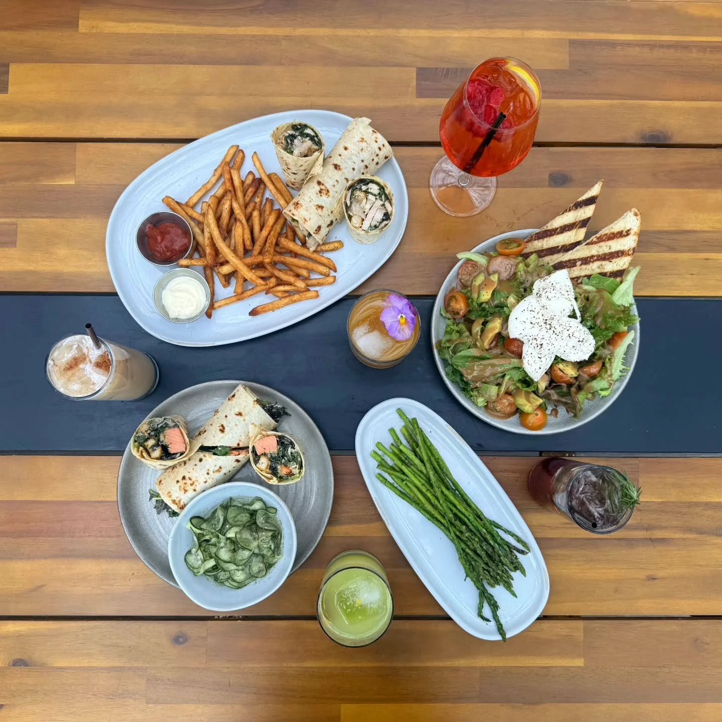Allow us to introduce... our new spring menu options! We've got some exciting new food, cocktails, and even another NA mocktail! What are you most excited to try?

Food 🥗

Kale Caesar Wrap
Lemon pepper chicken or grilled salmon wrapped in lefse with