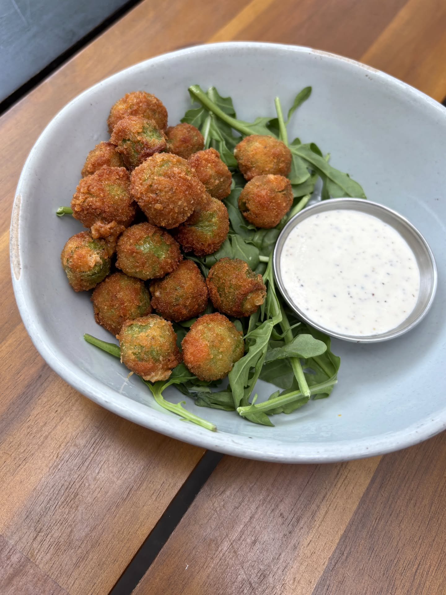 We've got some brand new light summer snacks to enjoy at one of our upcoming Pride events or World Cup watch parties! 🏳️&zwj;🌈⚽️

Fried Castelvetrano Olives - with a Blue cheese dipping sauce

Cashew Lemon Basil Spread - made in house and served wi