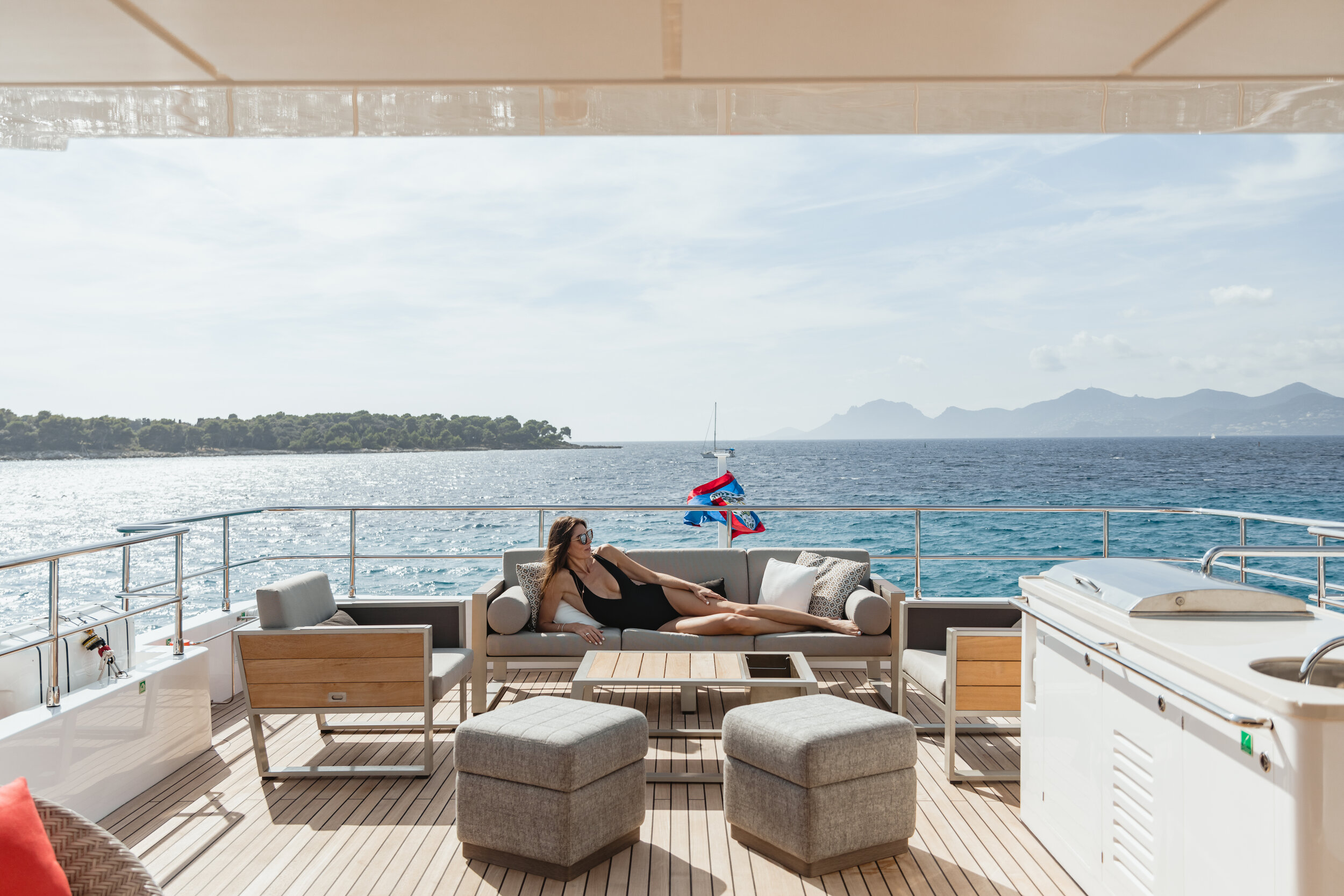 Woman on a luxury majesty 100 yacht in Nice