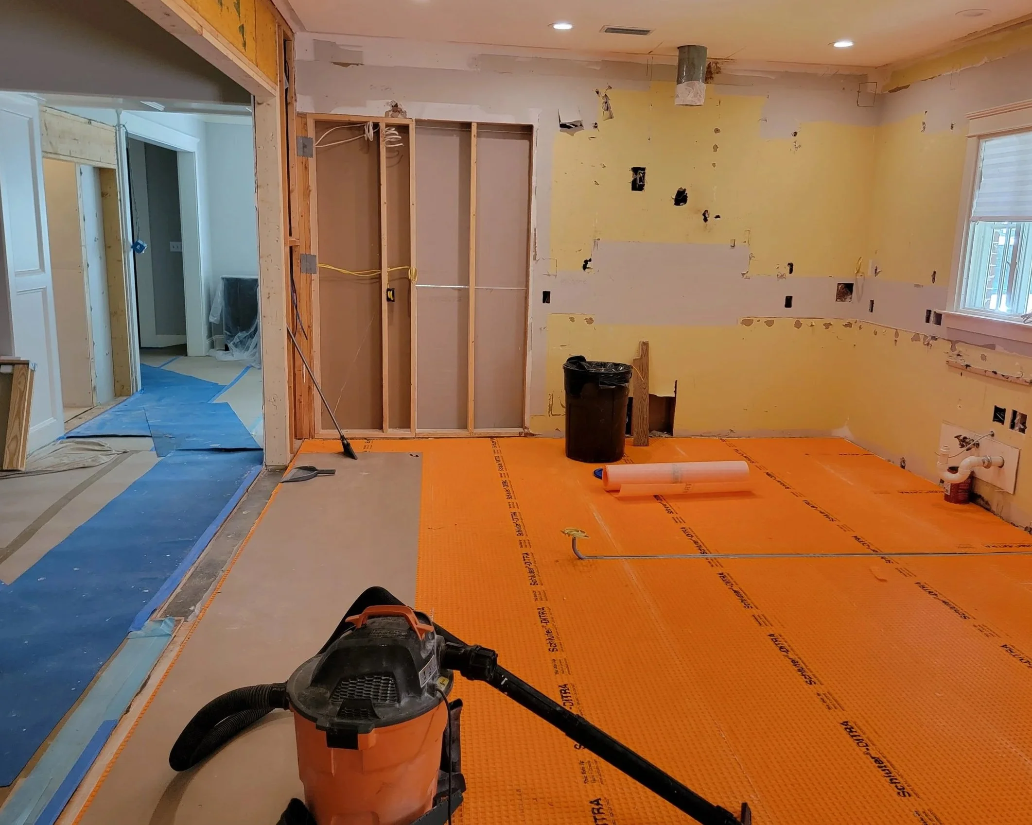 Floor prep with Schluter uncoupling membrane.