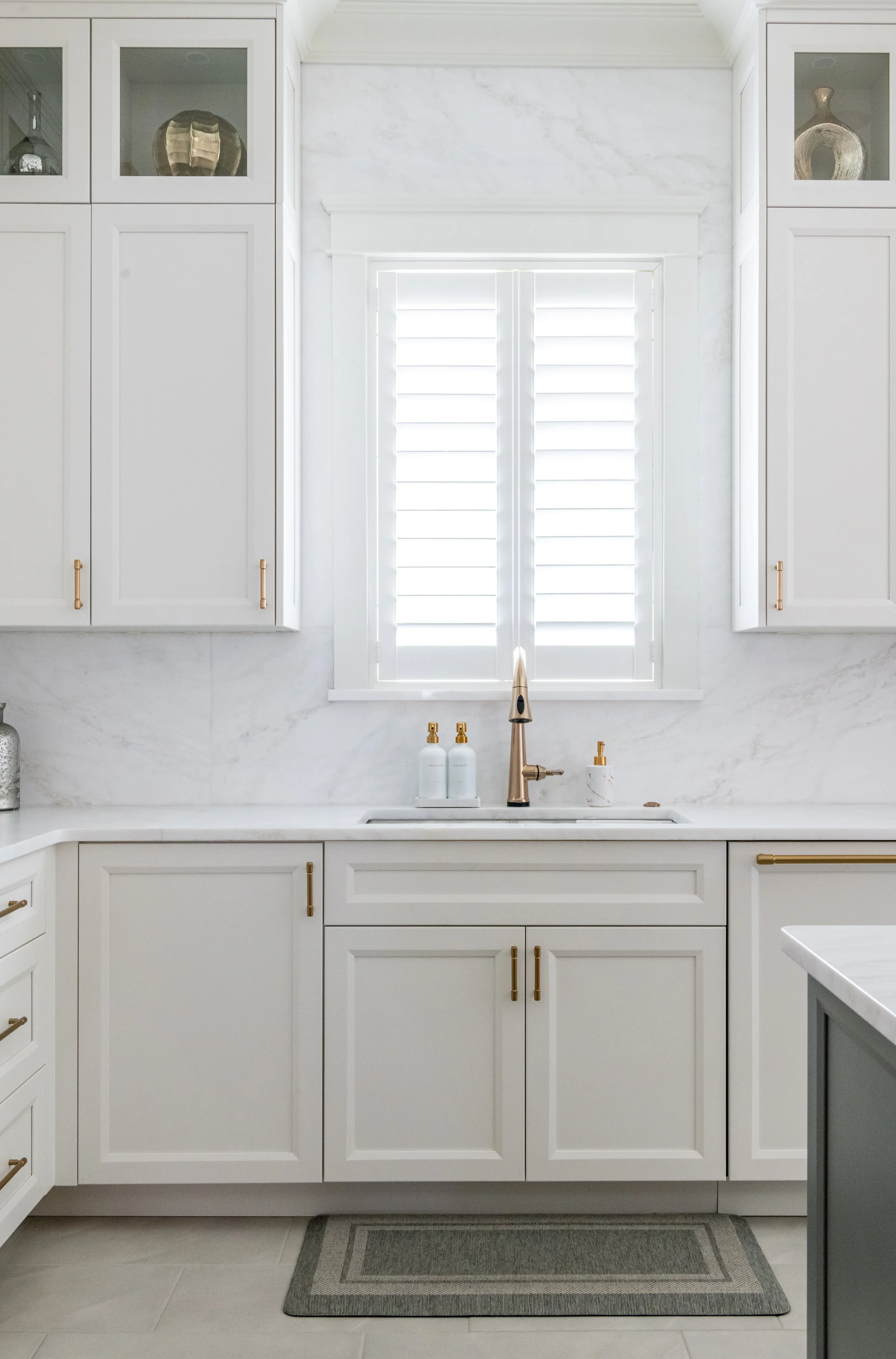 The new kitchen sink and stone backsplash.