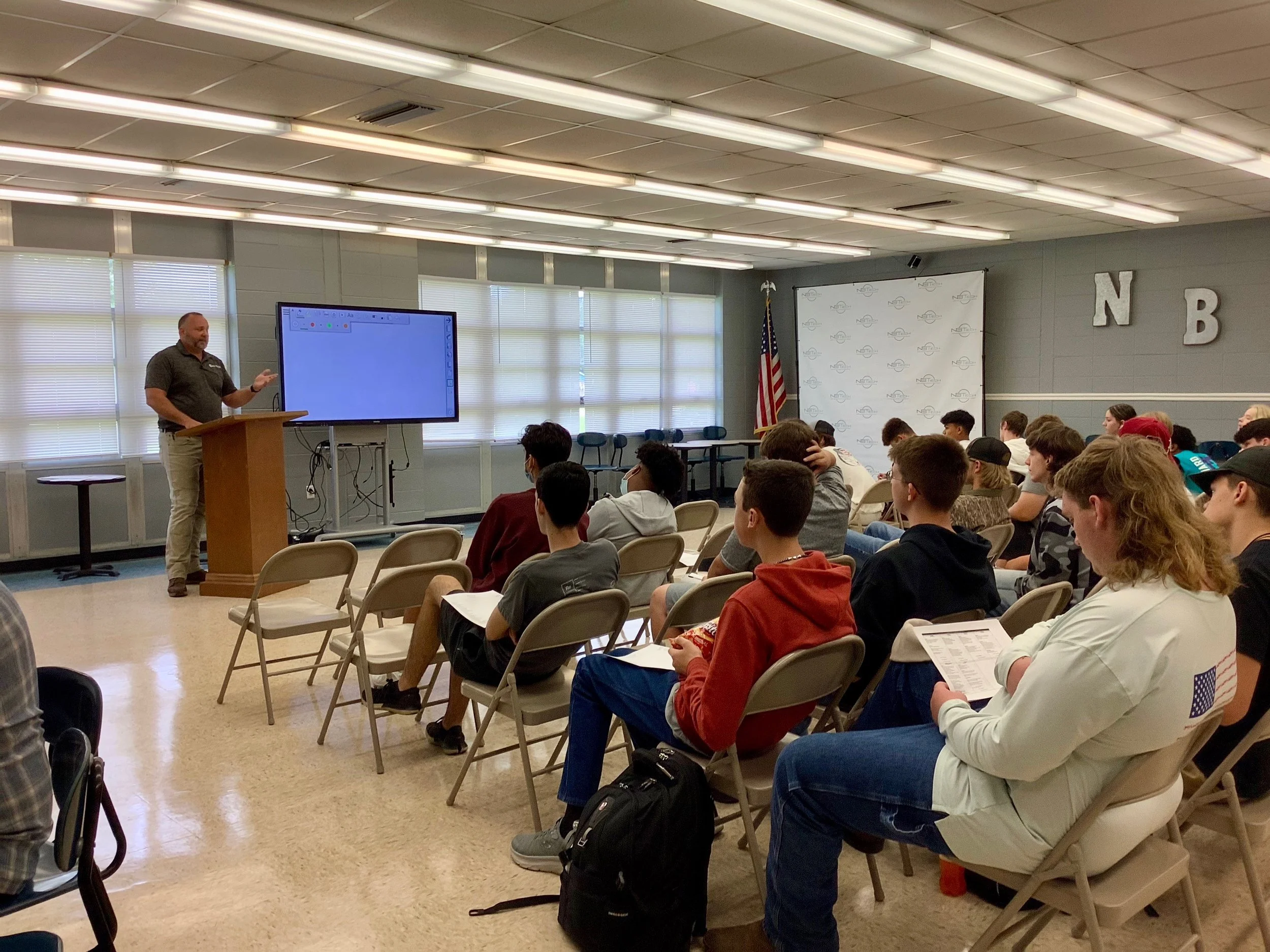 The owner president of mako services Bryan Hodges speaking as a guest speaker at Baldwin Preparatory school in Foley, Alabama.